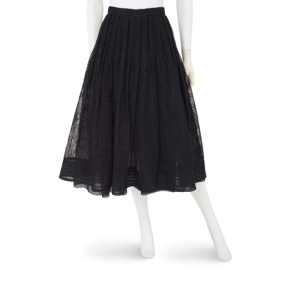 CHANEL: BLACK EYELET AND TULLE SKIRT Spring 2011 | Look 58: CHANEL: BLACK EYELET AND TULLE SKIRT Spring 2011 | Look 58 • Black Silk Blend Eyelet Exterior with Multiple Layers of Pintucked Tulle Underlay • Zip Closure • Marked Size 40 For furt