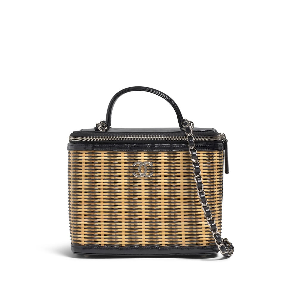 CHANEL: MEDIUM TAKE AWAY VANITY CASE Cruise 2020: CHANEL: MEDIUM TAKE AWAY VANITY CASE Cruise 2020 • Black Glazed Calfskin and Natural Wicker Exterior • Silver Tone Hardware with CC Logo Detail and Protective Feet at Base • Leather 