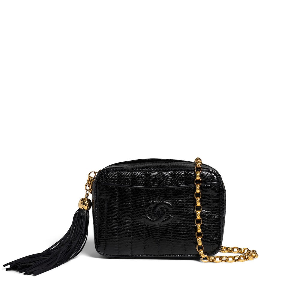 CHANEL: BLACK LIZARD QUILTED CAMERA BAG 1991-1994: CHANEL: BLACK LIZARD QUILTED CAMERA BAG 1991-1994 • Black Lizard Quilted Exterior with CC Quilted Detail • Gold Tone Hardware • Bijoux Shoulder Strap • Exterior Patch Pocket on