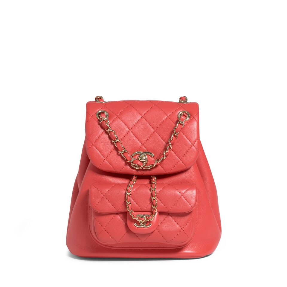 CHANEL: RED QUILTED SMALL DUMA BACKPACK 2022: CHANEL: RED QUILTED SMALL DUMA BACKPACK 2022 • Red Quilted and Smooth Lambskin Leather Exterior • Gold Tone Hardware • Leather and Chain Adjustable Shoulder Straps and Chain Handle &
