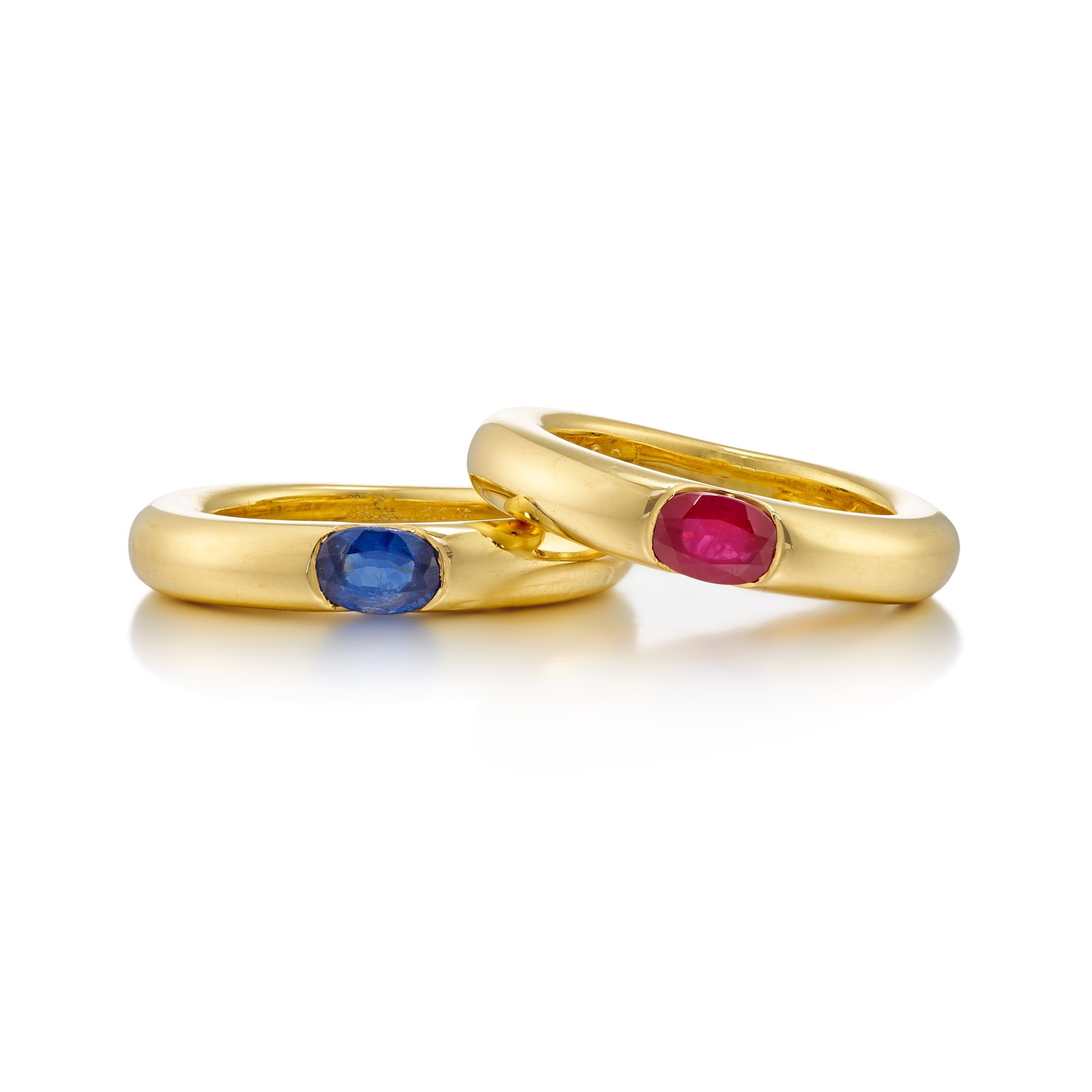 CARTIER: A SET OF 18K GOLD AND GEM-SET 'ELLIPSE' RINGS (1 of 1)