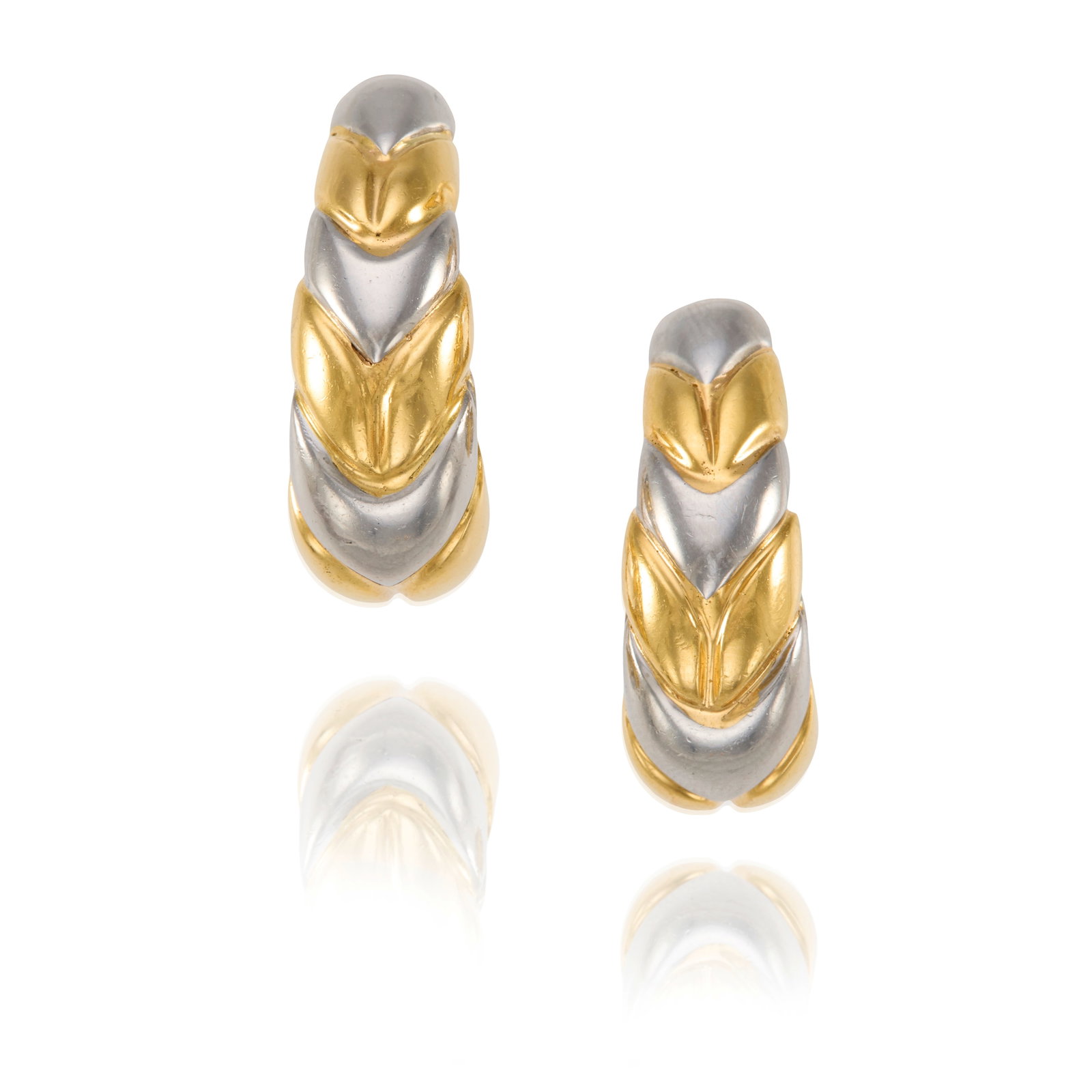 BULGARI: A PAIR OF 18K GOLD AND STAINLESS STEEL 'SPIGA' EARRINGS: BULGARI: A PAIR OF 18K GOLD AND STAINLESS STEEL 'SPIGA' EARRINGS Each of repeating chevron pattern; signed Bulgari; with Italian registered trademark; measures 1 1/8 in. Footnotes: OVERALL CONDITION: 