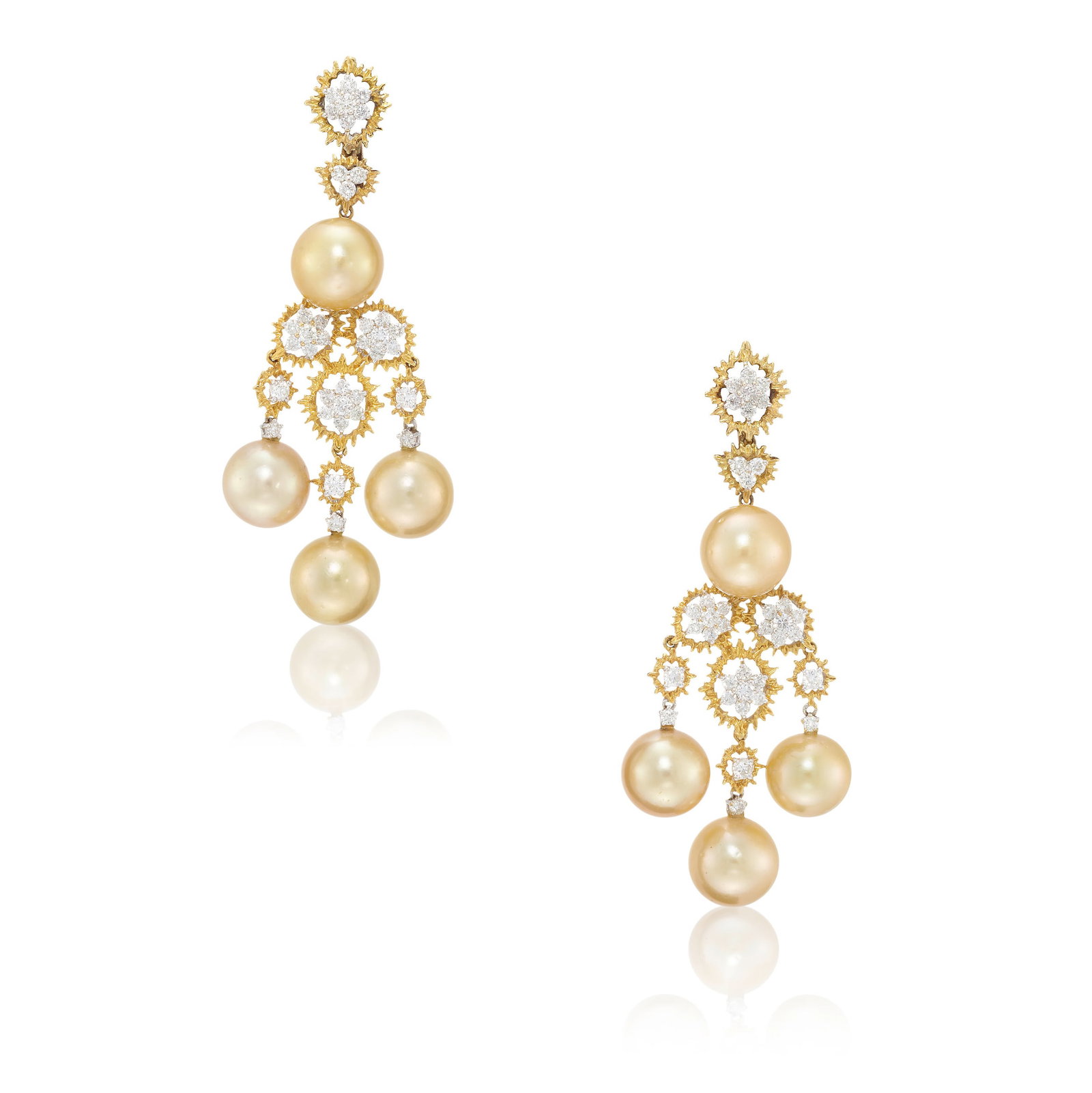 BUCCELLATI: A PAIR OF CULTURED PEARL AND DIAMOND EARRINGS: BUCCELLATI: A PAIR OF CULTURED PEARL AND DIAMOND EARRINGS Each designed as a chandelier earring centering four cultured pearls, measuring approximately 11.5 mm, within a frame of textured gold, accent