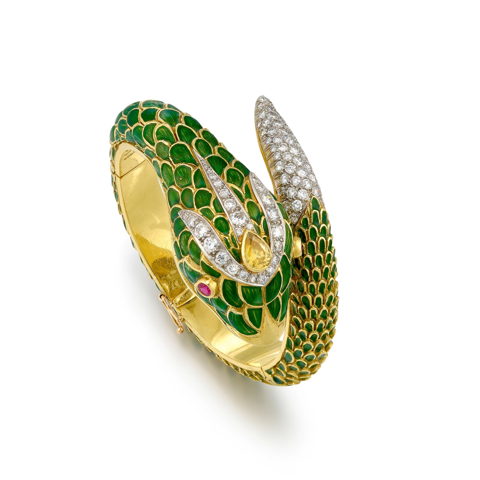 AN 18K GOLD, PLATINUM, DIAMOND AND ENAMEL BRACELET: AN 18K GOLD, PLATINUM, DIAMOND AND ENAMEL BRACELET A hinged bangle designed as a snake, with a body of green enamel, the head centering a pear-shaped diamond of a yellow hue, with platinum and pav