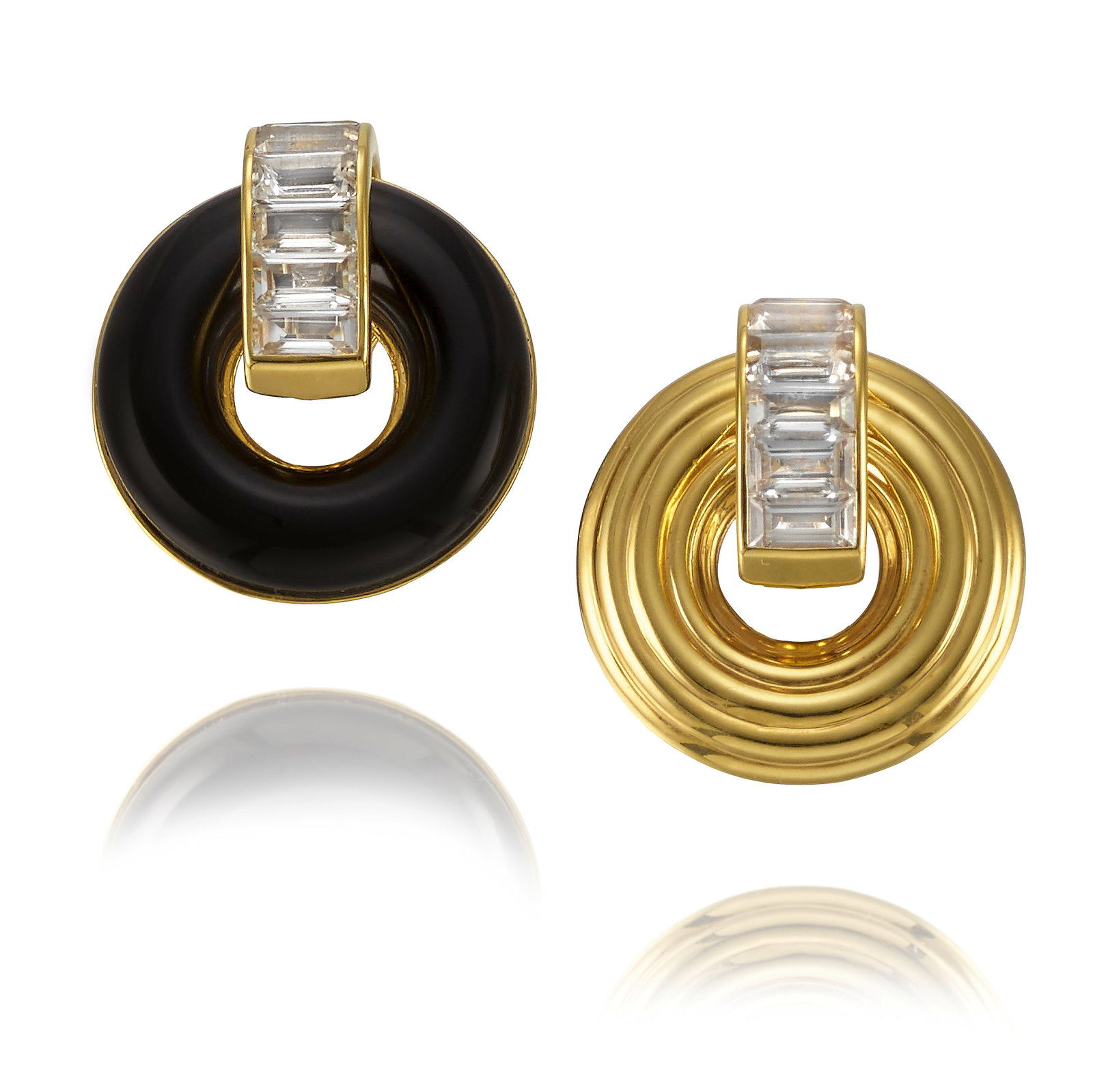 SEAMAN SCHEPPS: A PAIR OF 18K GOLD, WHITE TOPAZ AND ONYX 'GIRO' CONVERTIBLE EARCLIPS: SEAMAN SCHEPPS: A PAIR OF 18K GOLD, WHITE TOPAZ AND ONYX 'GIRO' CONVERTIBLE EARCLIPS Each designed with removable and reversible black onyx and fluted gold disks, braced by bands of baguette-cut white