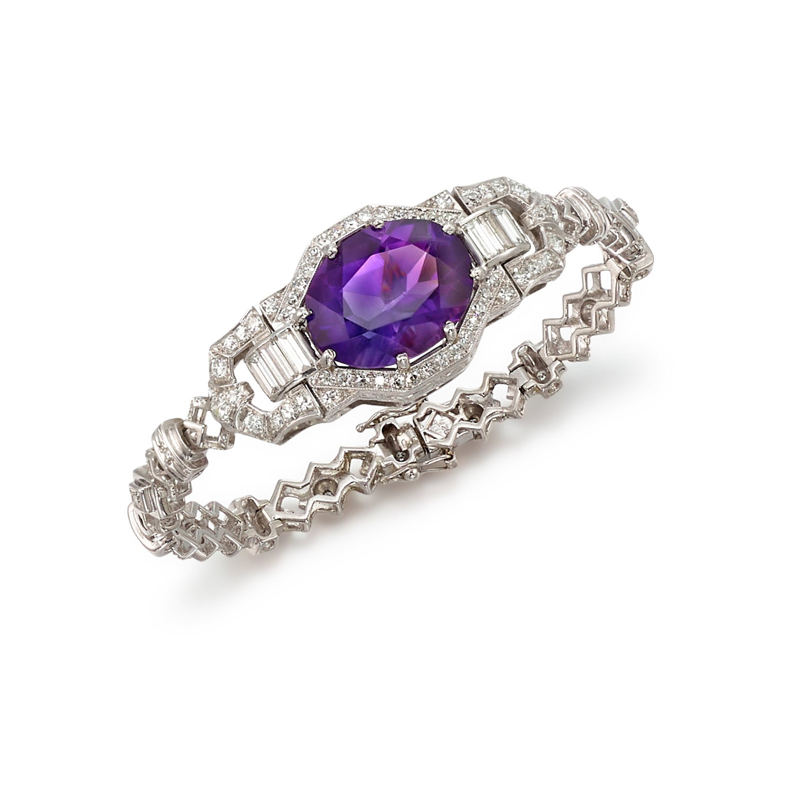 AN 18K WHITE GOLD, AMETHYST AND DIAMOND BRACELET, CIRCA 1950: AN 18K WHITE GOLD, AMETHYST AND DIAMOND BRACELET, CIRCA 1950 Centering an oval-shaped amethyst, accented across with old European, old mine, transitional, single and baguette-cut diamonds; with