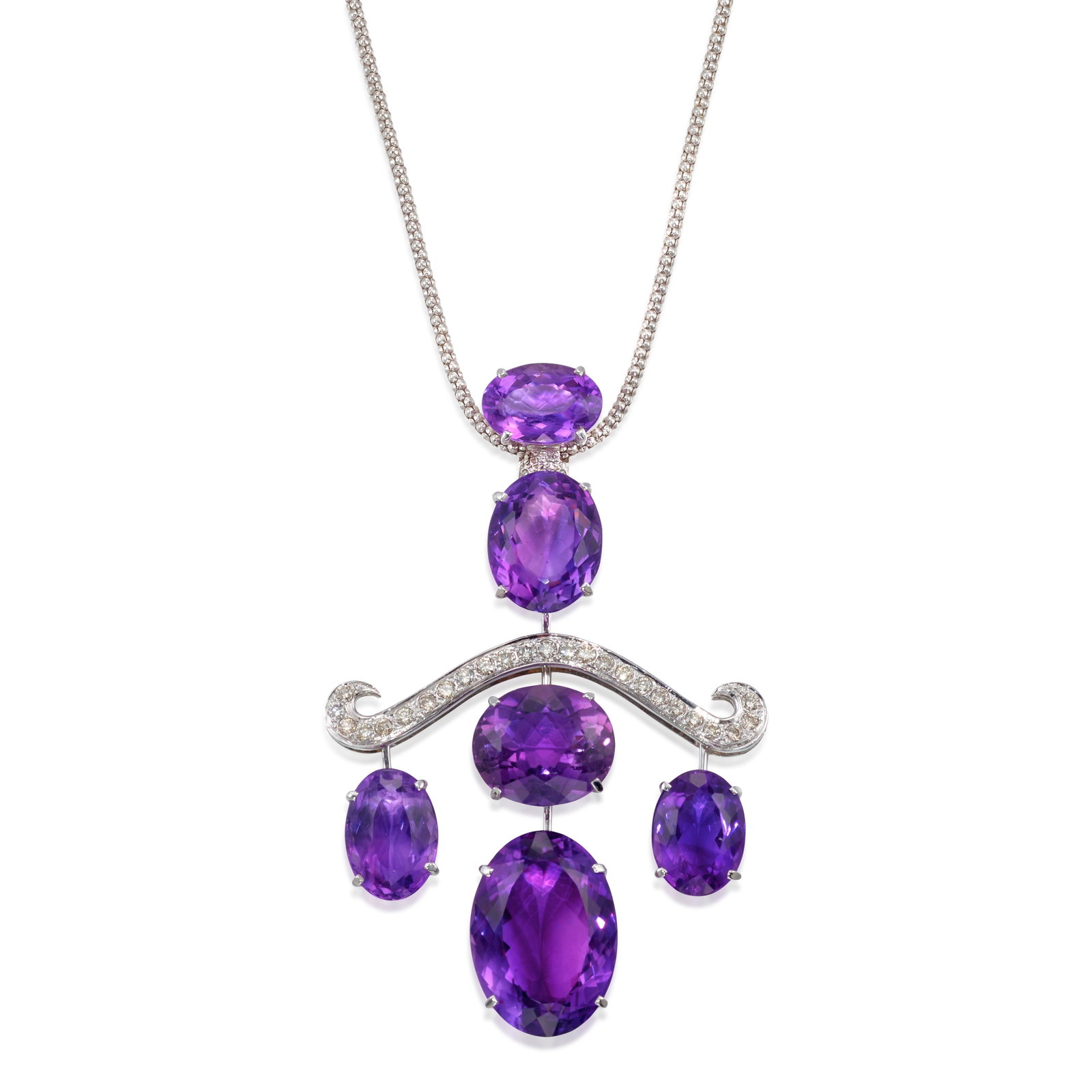 AN AMETHYST AND DIAMOND PENDANT NECKLACE: AN AMETHYST AND DIAMOND PENDANT NECKLACE The pendant comprising oval-shaped amethysts, accented by a ribbon of round brilliant-cut diamonds, suspended from a fancy link chain; chain with Italian regis