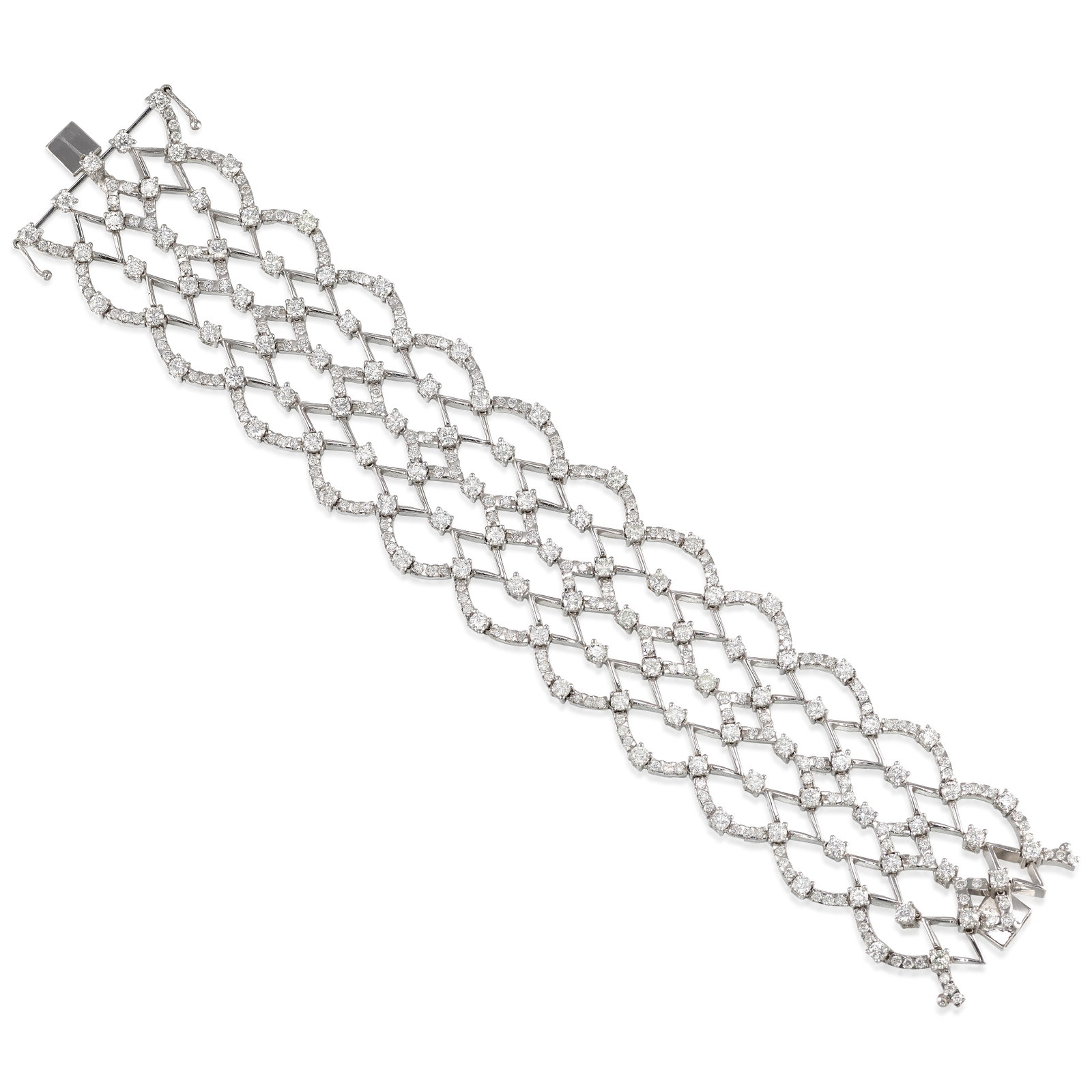 AN 18K WHITE GOLD AND DIAMOND BRACELET: AN 18K WHITE GOLD AND DIAMOND BRACELET Of openwork, lattice design, set throughout with round brilliant-cut diamonds; estimated total diamond weight 10.25 carats; length 6 7/8 in., width 1 1/4 in.