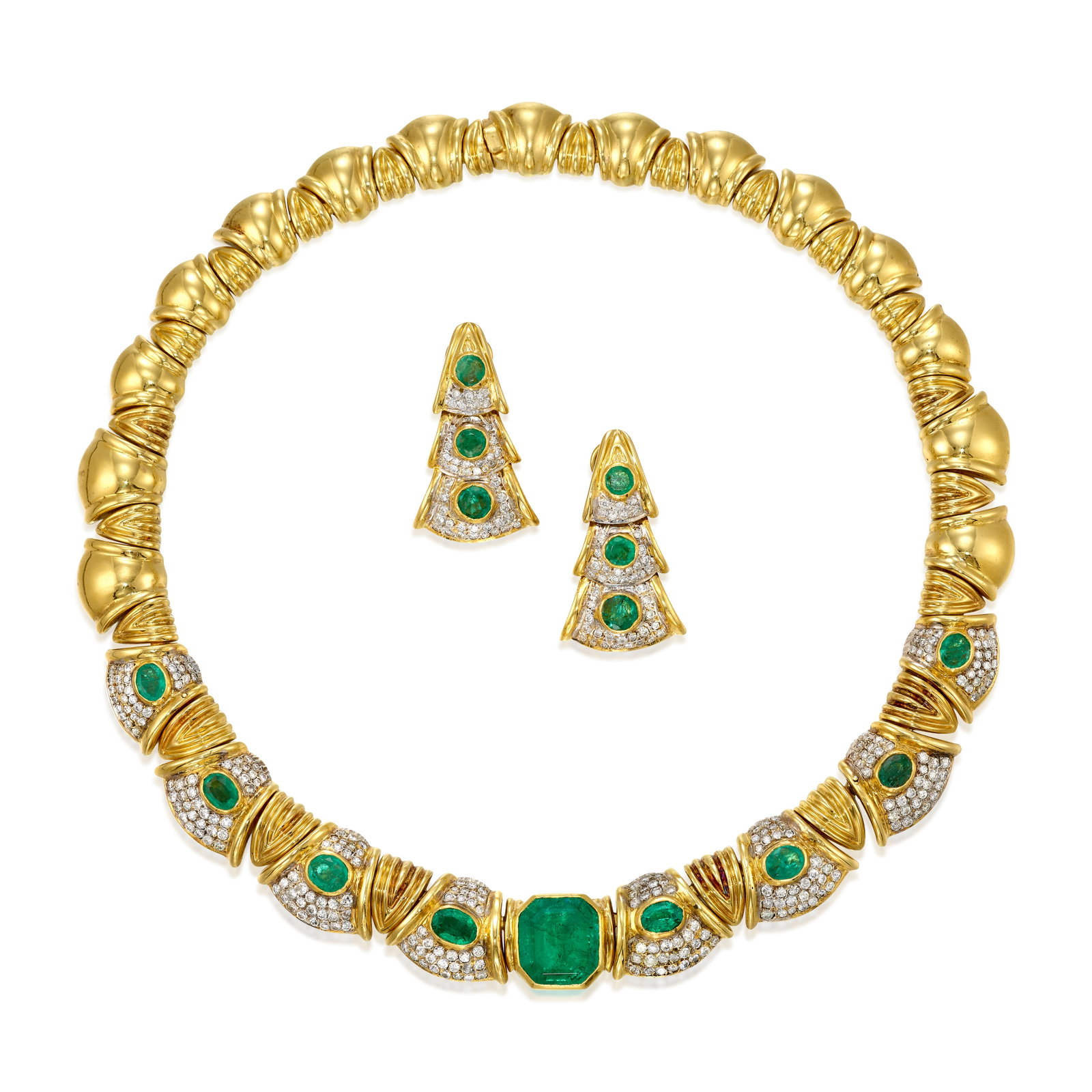 AN EMERALD AND DIAMOND NECKLACE AND EARRING SET: AN EMERALD AND DIAMOND NECKLACE AND EARRING SET The necklace designed as a collar comprising fan-shaped elements, the middle few accented with oval-shaped emeralds and pavé-set, round