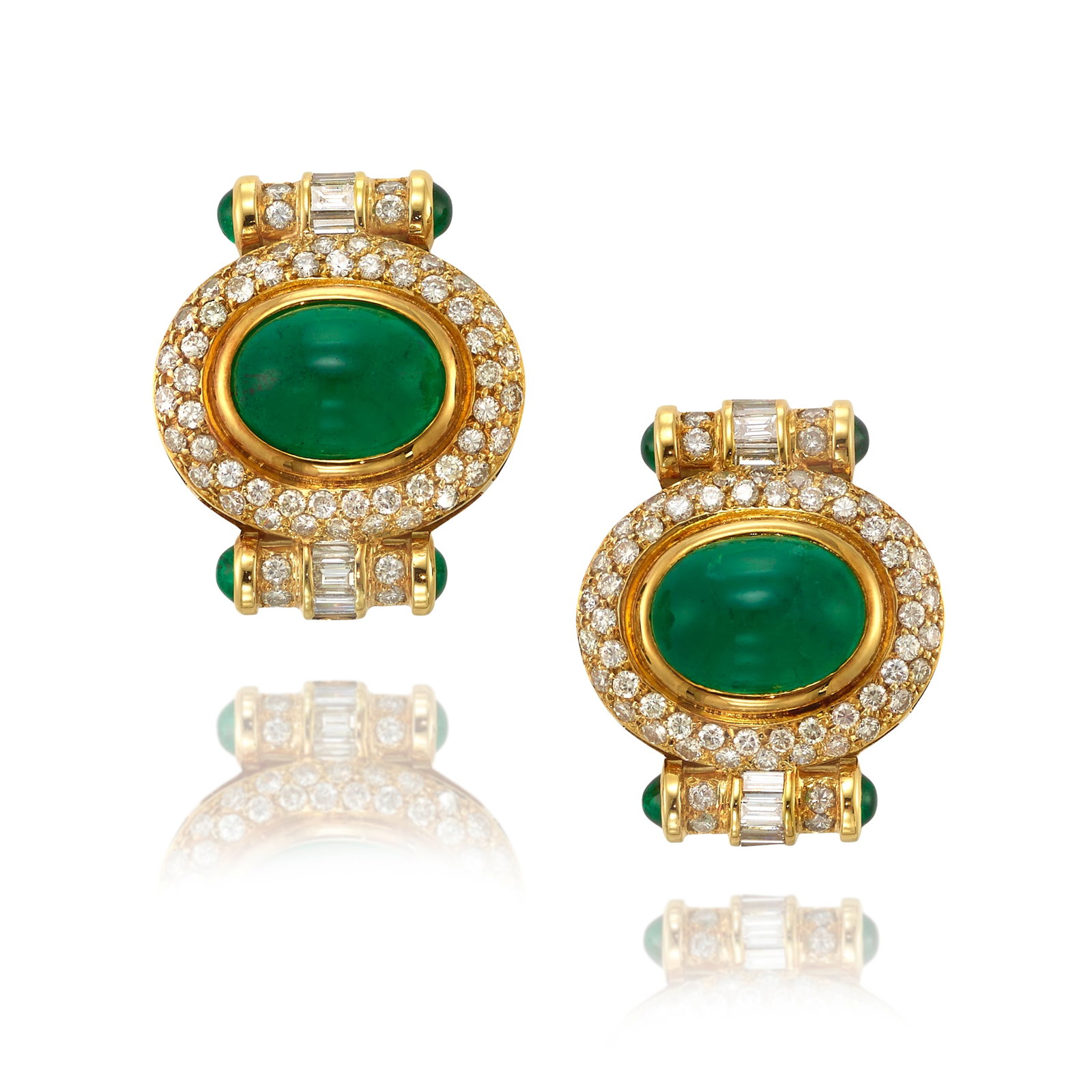 A PAIR OF EMERALD AND DIAMOND EARRINGS: A PAIR OF EMERALD AND DIAMOND EARRINGS Each centering oval-shaped cabochon emeralds, surrounded by round brilliant and baguette-cut diamonds, the terminals accented with round cabochon emeralds;