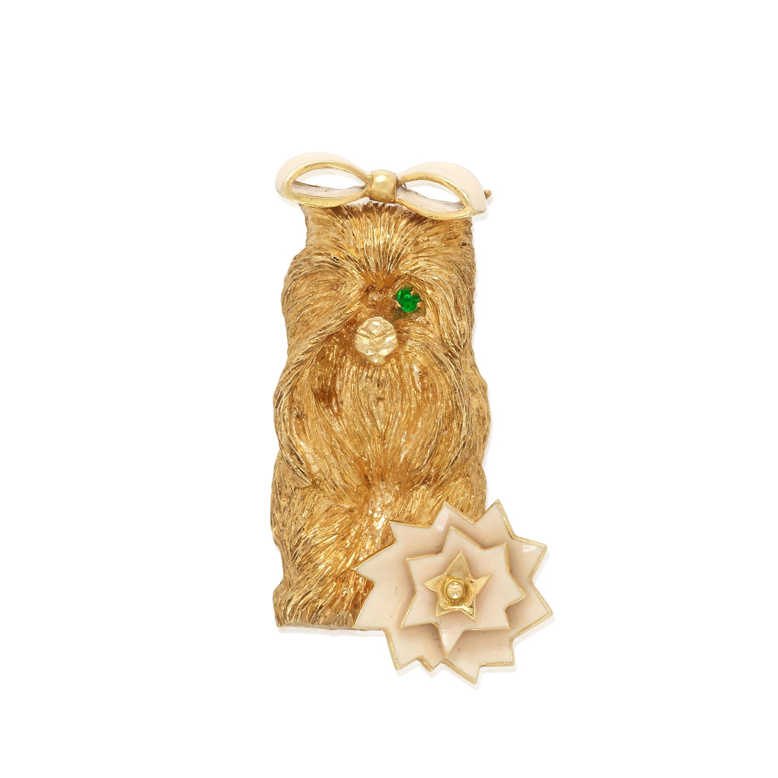 CARTIER: AN ENAMEL AND EMERALD BROOCH, FRANCE, CIRCA 1965: CARTIER: AN ENAMEL AND EMERALD BROOCH, FRANCE, CIRCA 1965 Designed as a yorkshire terrier with an emerald eye, decorated with pink enameled bow and toy; signed Cartier Inc.; with partial maker's mark;