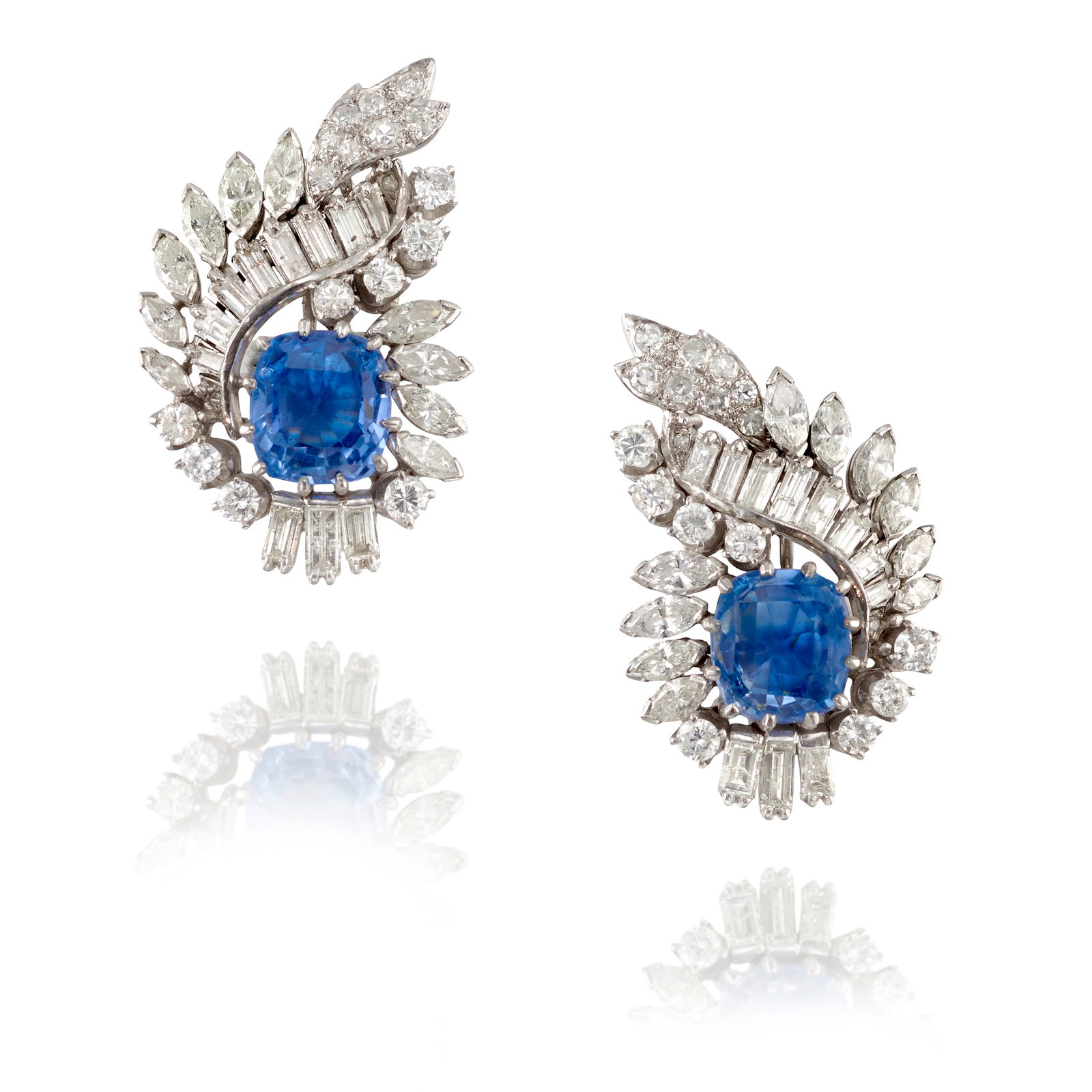 A PAIR OF SAPPHIRE AND DIAMOND EARRINGS: A PAIR OF SAPPHIRE AND DIAMOND EARRINGS Each comprising cushion-shaped sapphires, accented by clusters of round brilliant, single, baguette-cut and marquise-shaped diamonds; estimated total sapphire