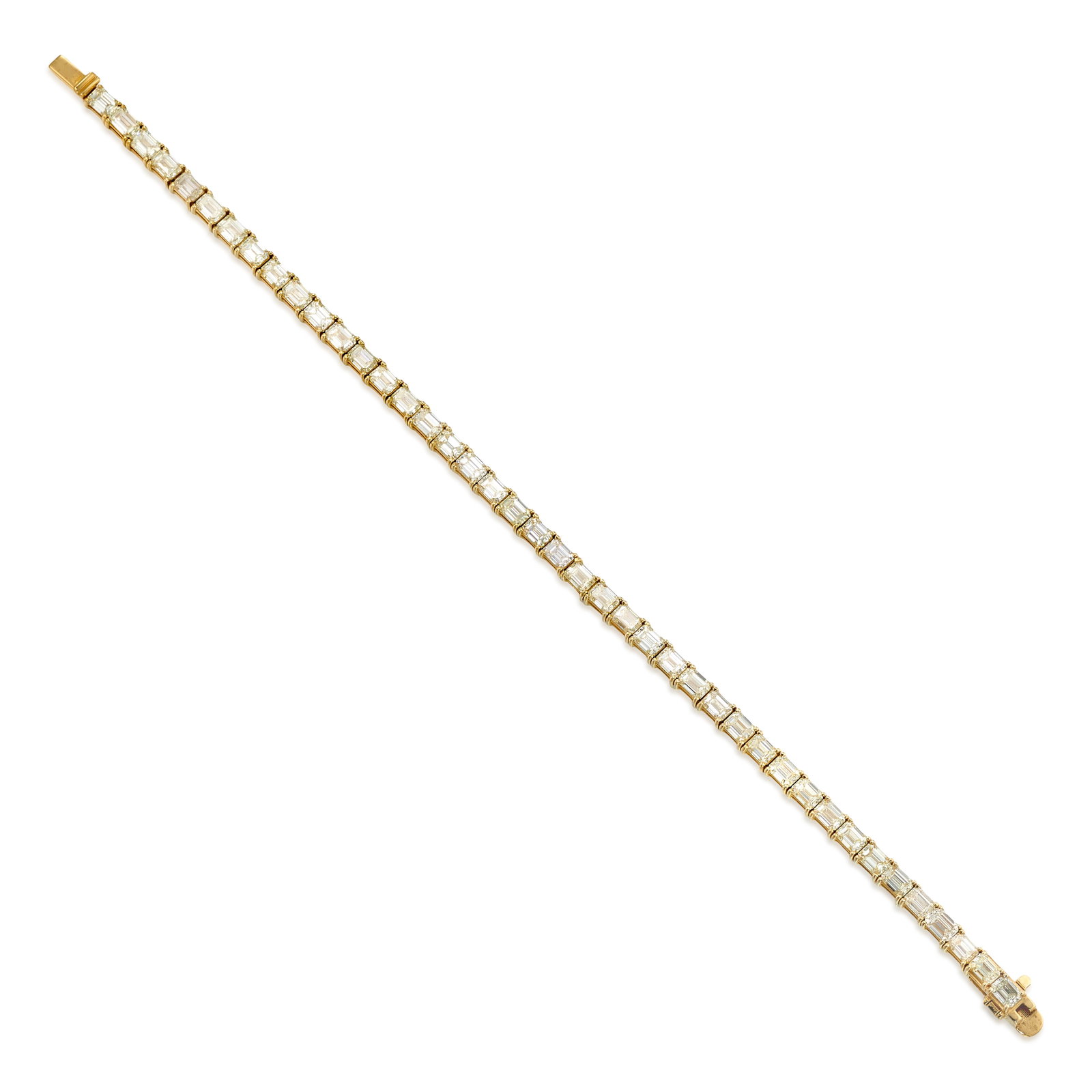 A 14K GOLD AND DIAMOND BRACELET: A 14K GOLD AND DIAMOND BRACELET A line bracelet comprising octagonal step-cut diamonds; estimated total diamond weight 10.25 carats; length 7 1/4 in. Footnotes: OVERALL CONDITION: Metal stamped and