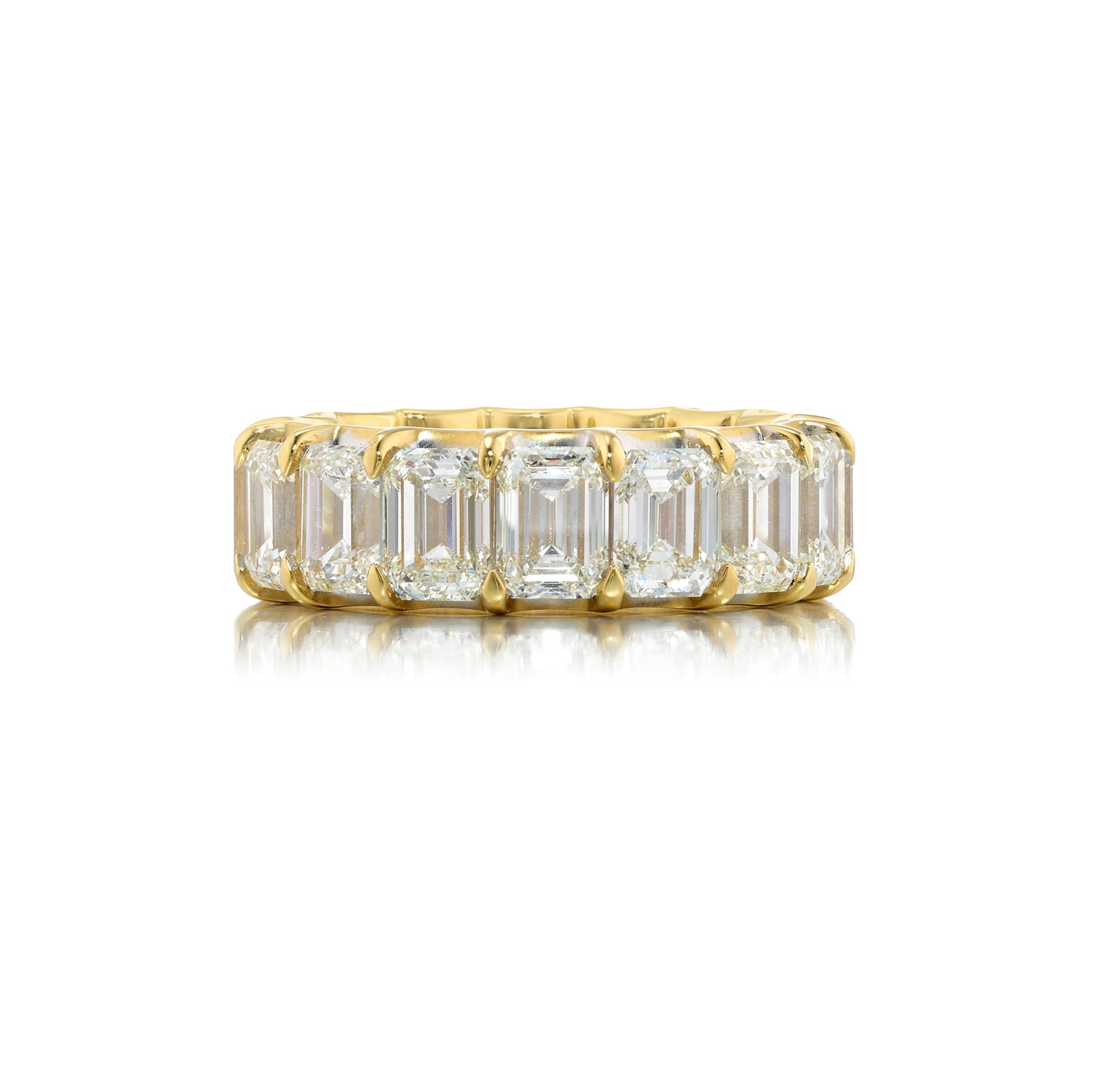 A DIAMOND RING: A DIAMOND RING An eternity band comprising emerald-cut diamonds, weighing 11.23 carats; mounted in 18k gold; size 7 Footnotes: Accompanied by GIA Reports 7523865647, 7511769672, 6532350179, 2527806785