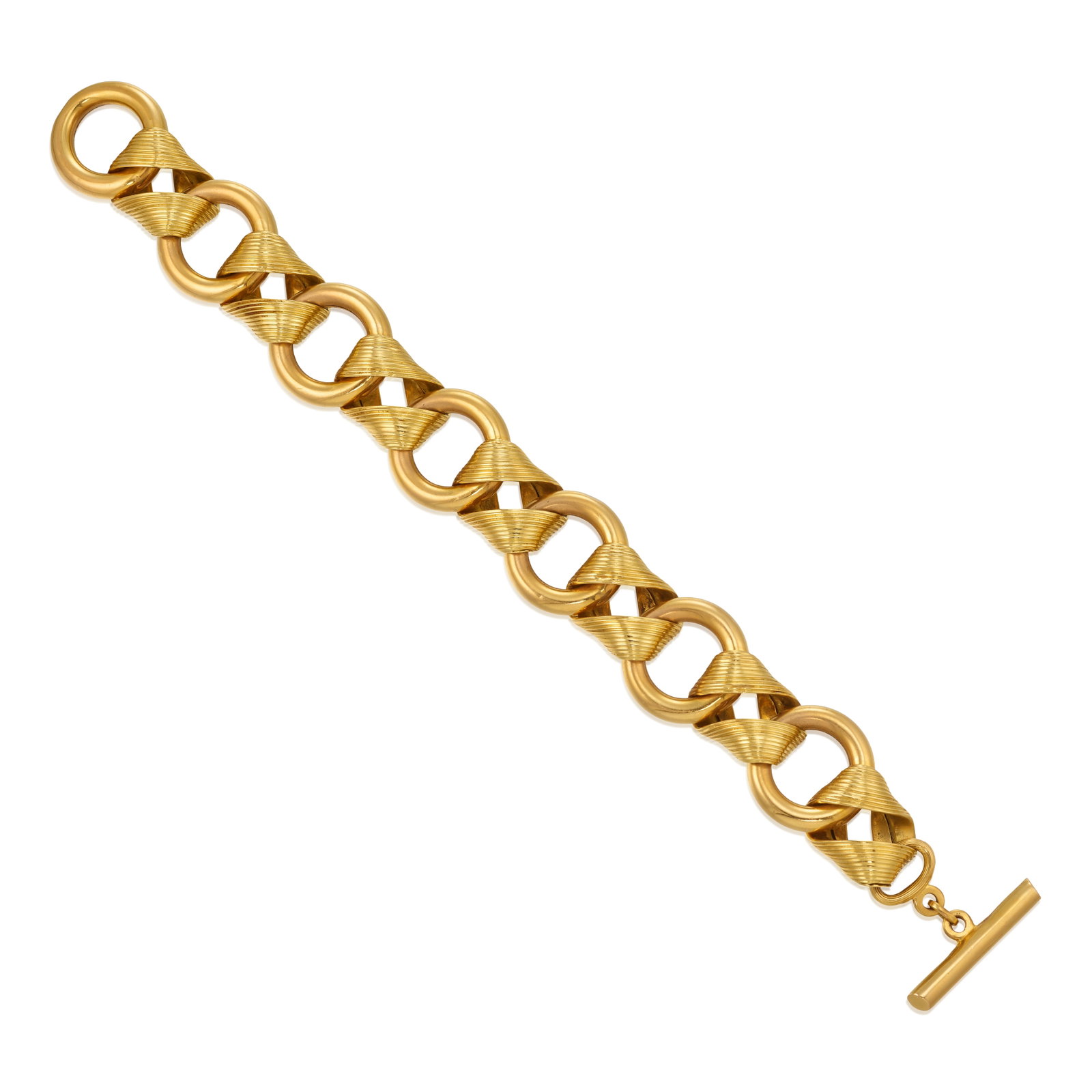 AN 18K GOLD BRACELET, CIRCA 1950: AN 18K GOLD BRACELET, CIRCA 1950 A hollow, fancy link chain bracelet; with Italian registered trademark; length 8 1/2 in. Footnotes: OVERALL CONDITION: Metal stamped and tested with XRF (X-ray fluores
