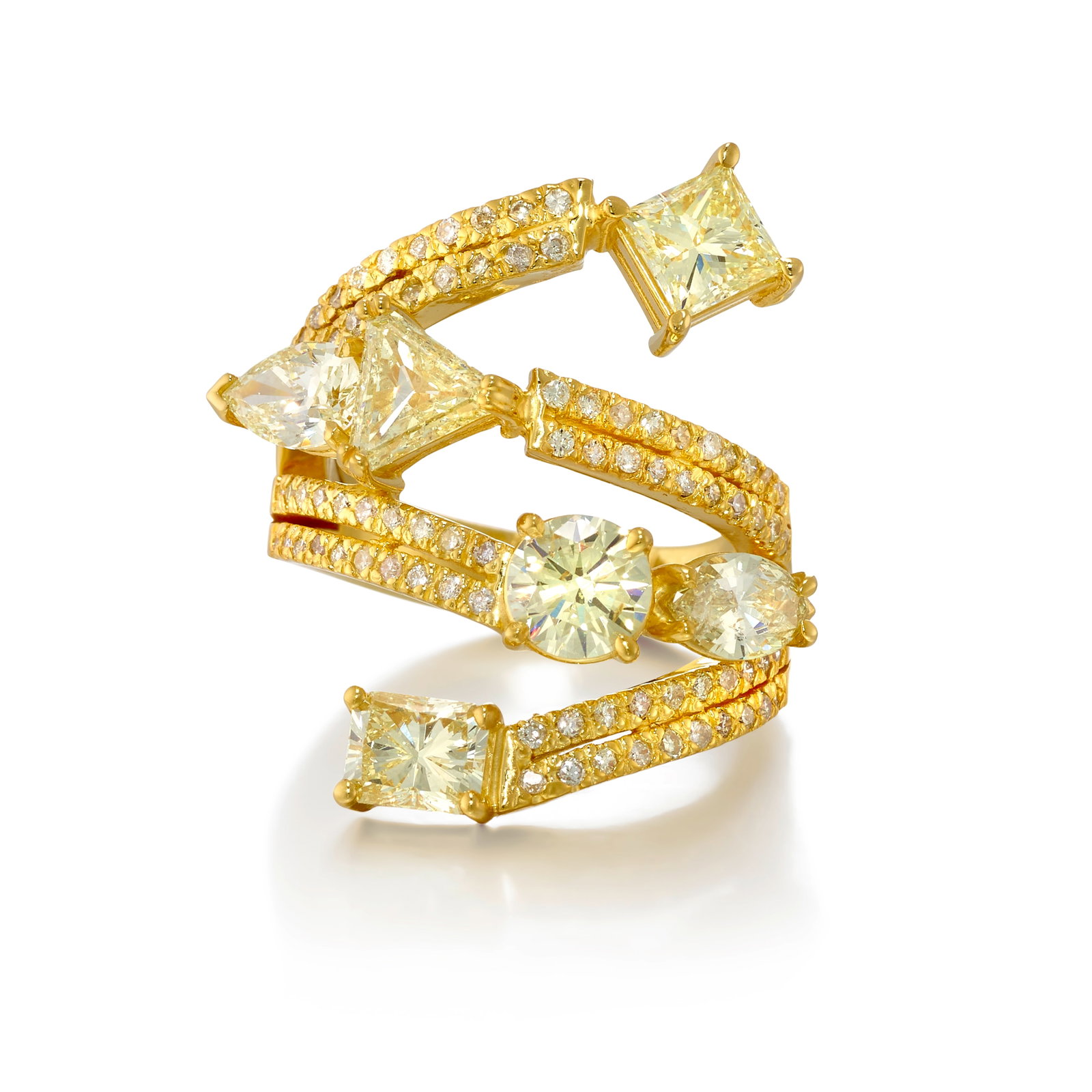 A 14K GOLD AND DIAMOND RING: A 14K GOLD AND DIAMOND RING Of bypass design, comprising round brilliant, square, trilliant, octagonal, pear and marquise-shaped diamonds; estimated total diamond weight 3.50 carats; size 6 1/2 Footno