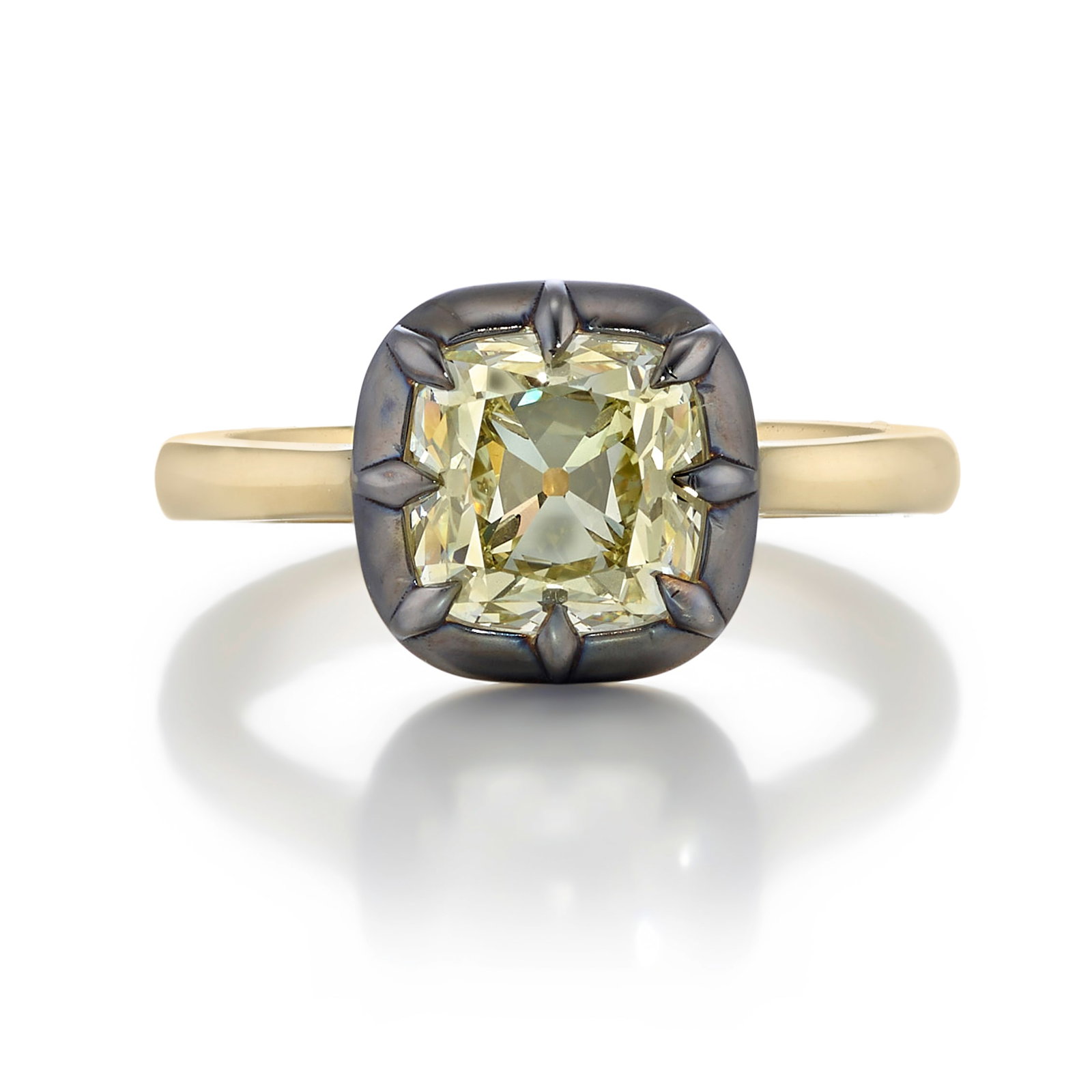 AN 18K GOLD, SILVER AND DIAMOND RING: AN 18K GOLD, SILVER AND DIAMOND RING Centering an old mine-cut diamond weighing 2.21 carats, mounted in silver, the gallery and shank of 18k gold; size 6 1/2 Footnotes: Accompanied by GIA Report 22318