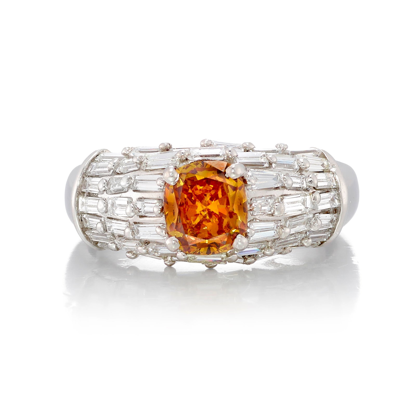 A FANCY DEEP YELLOWISH ORANGE DIAMOND AND DIAMOND RING: A FANCY DEEP YELLOWISH ORANGE DIAMOND AND DIAMOND RING Centering a cushion-shaped, modified brilliant-cut, Fancy Deep Yellowish Orange diamond, weighing 1.11 carats, in a mounting accented by baguette
