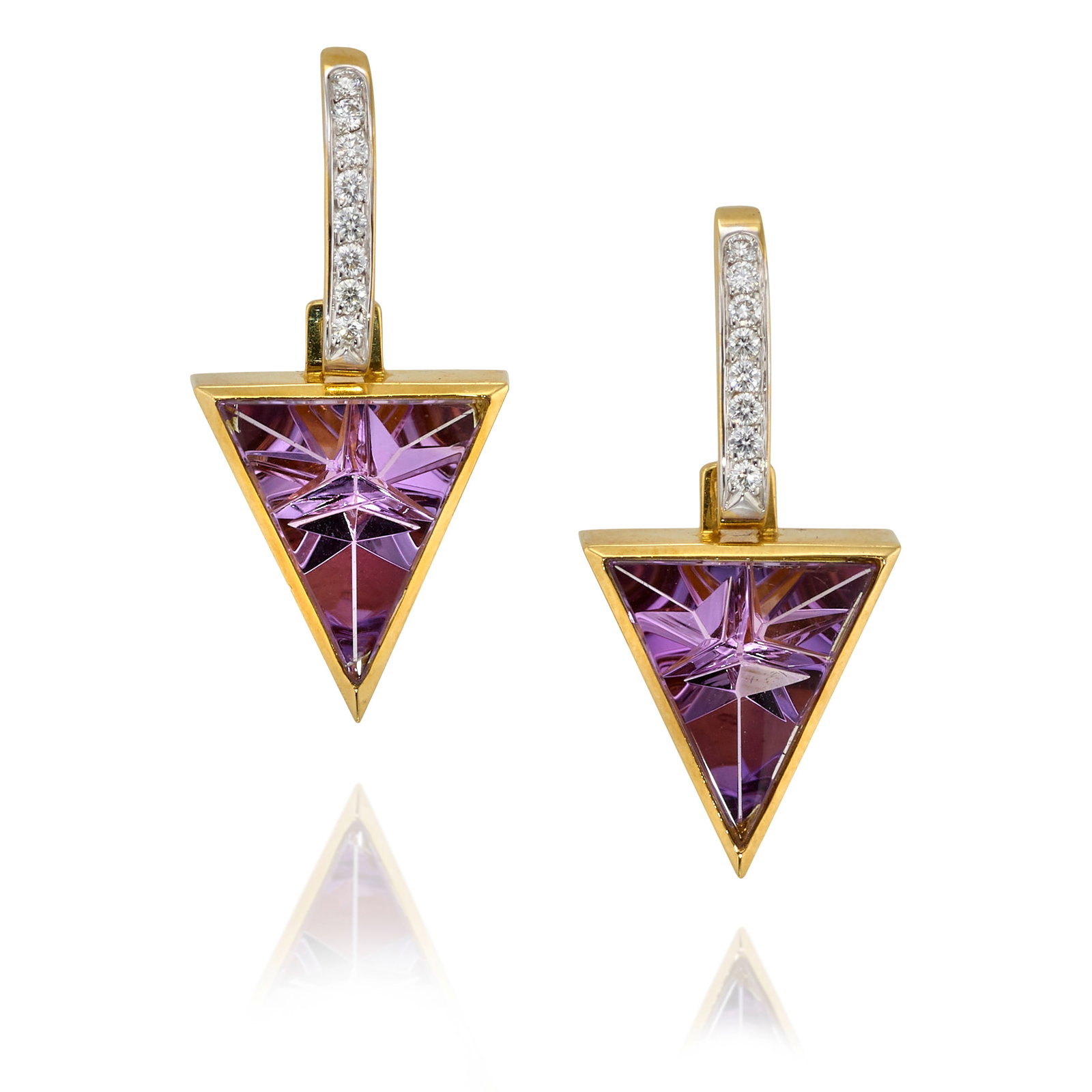 BARBARA WESTWOOD: A PAIR OF 18K BI-COLOR GOLD, AMETHYST AND DIAMOND CONVERTIBLE EARRINGS: BARBARA WESTWOOD: A PAIR OF 18K BI-COLOR GOLD, AMETHYST AND DIAMOND CONVERTIBLE EARRINGS Each design as bars of round brilliant-cut diamonds, suspending removable triangular, fantasy-cut amethyst;