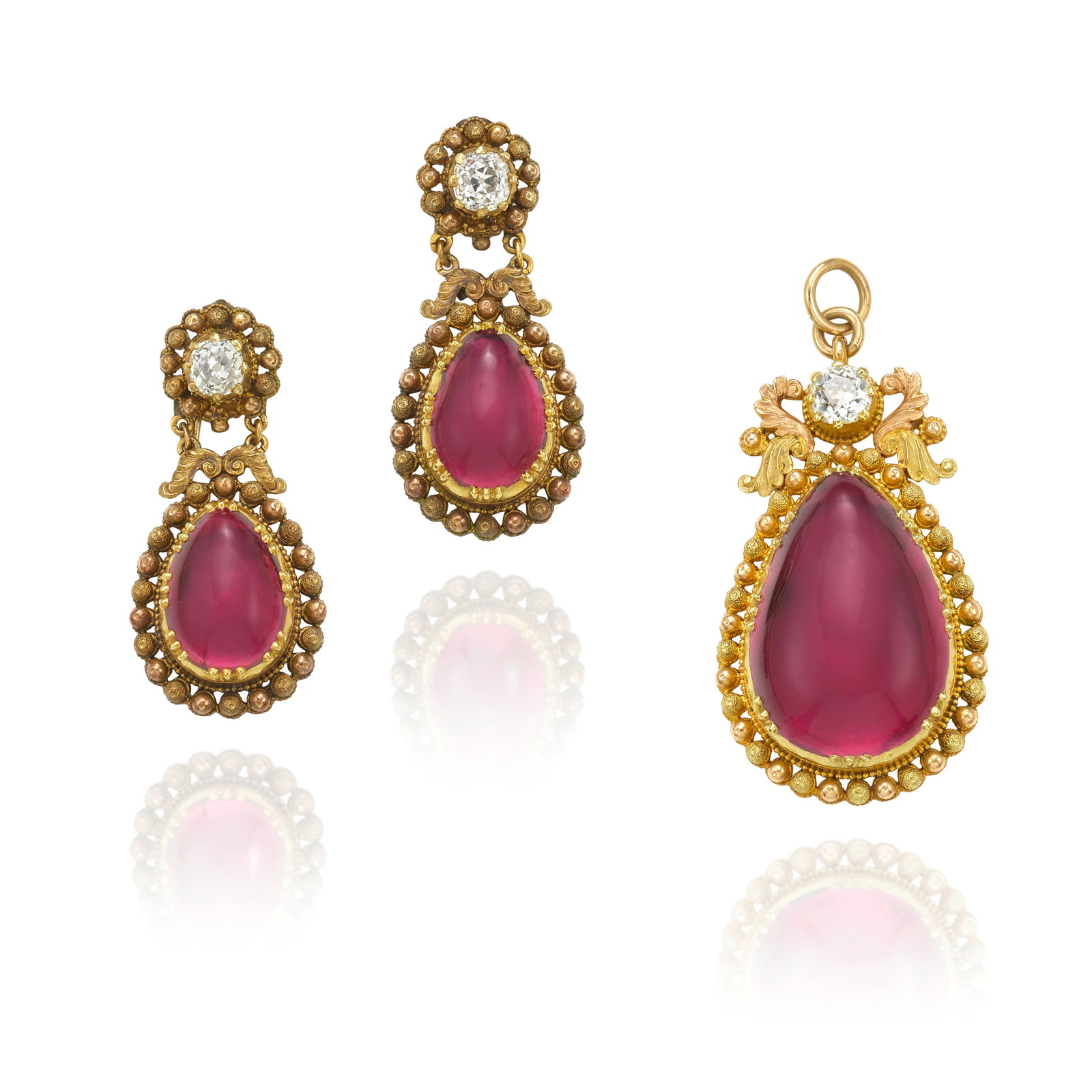 A GARNET AND DIAMOND PENDANT AND EARRING SET, CIRCA 1840: A GARNET AND DIAMOND PENDANT AND EARRING SET, CIRCA 1840 The pendant featuring a pear-shaped cabochon garnet in an ornate, tricolor gold setting, together with earrings of a complimentary design, all 