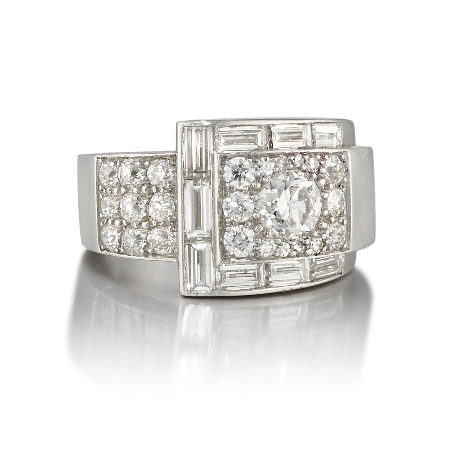 RAYMOND YARD: A DIAMOND RING, CIRCA 1935: RAYMOND YARD: A DIAMOND RING, CIRCA 1935 Of strap and buckle design, accented across with old European, single and baguette-cut diamonds; signed Yard; estimated center old European-cut diamond weight