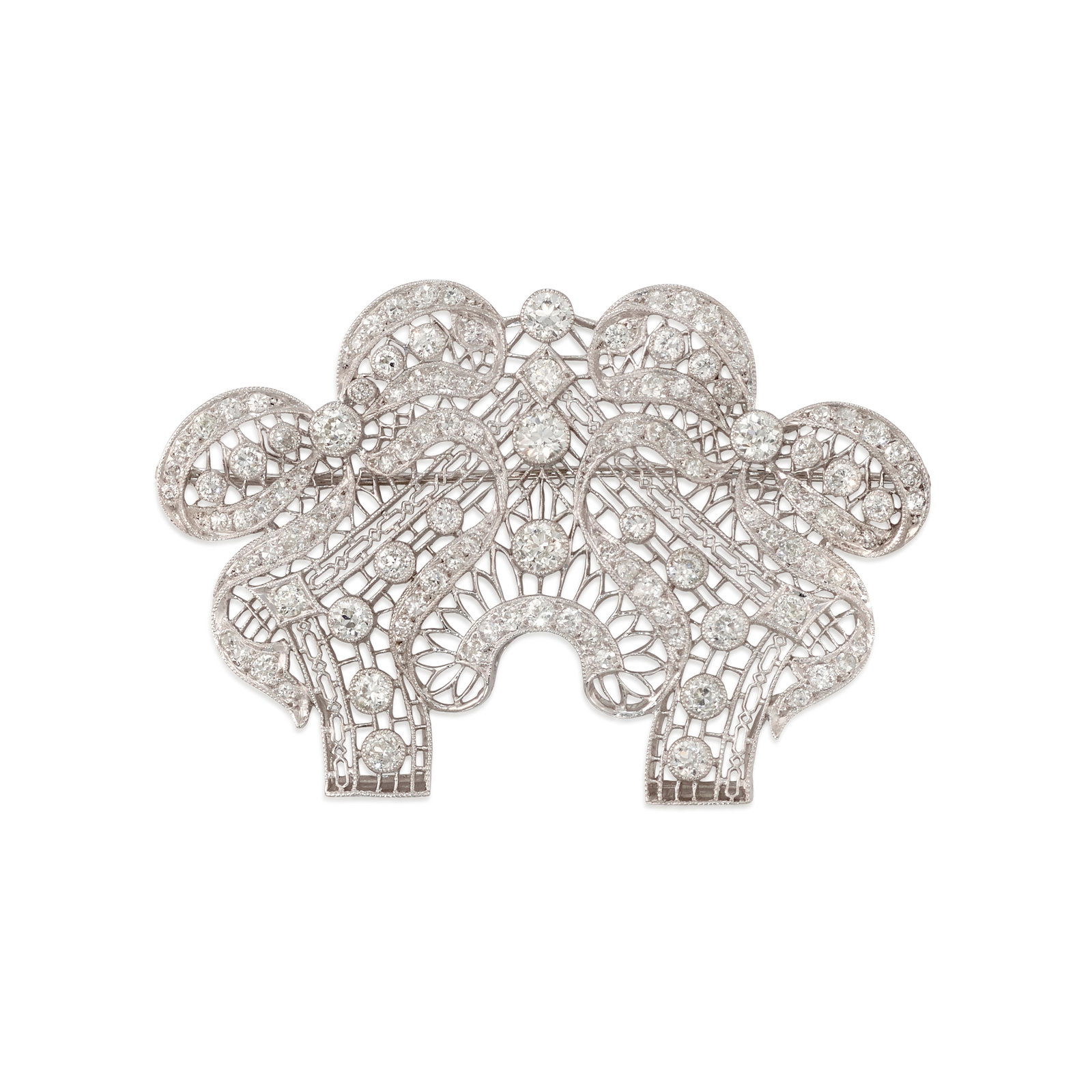 A DIAMOND BROOCH, CIRCA 1910: A DIAMOND BROOCH, CIRCA 1910 Of ornate, openwork design, set across with old European, old mine and single-cut diamonds; estimated total diamond weight 4.95 carats; mounted in white gold-plated platin