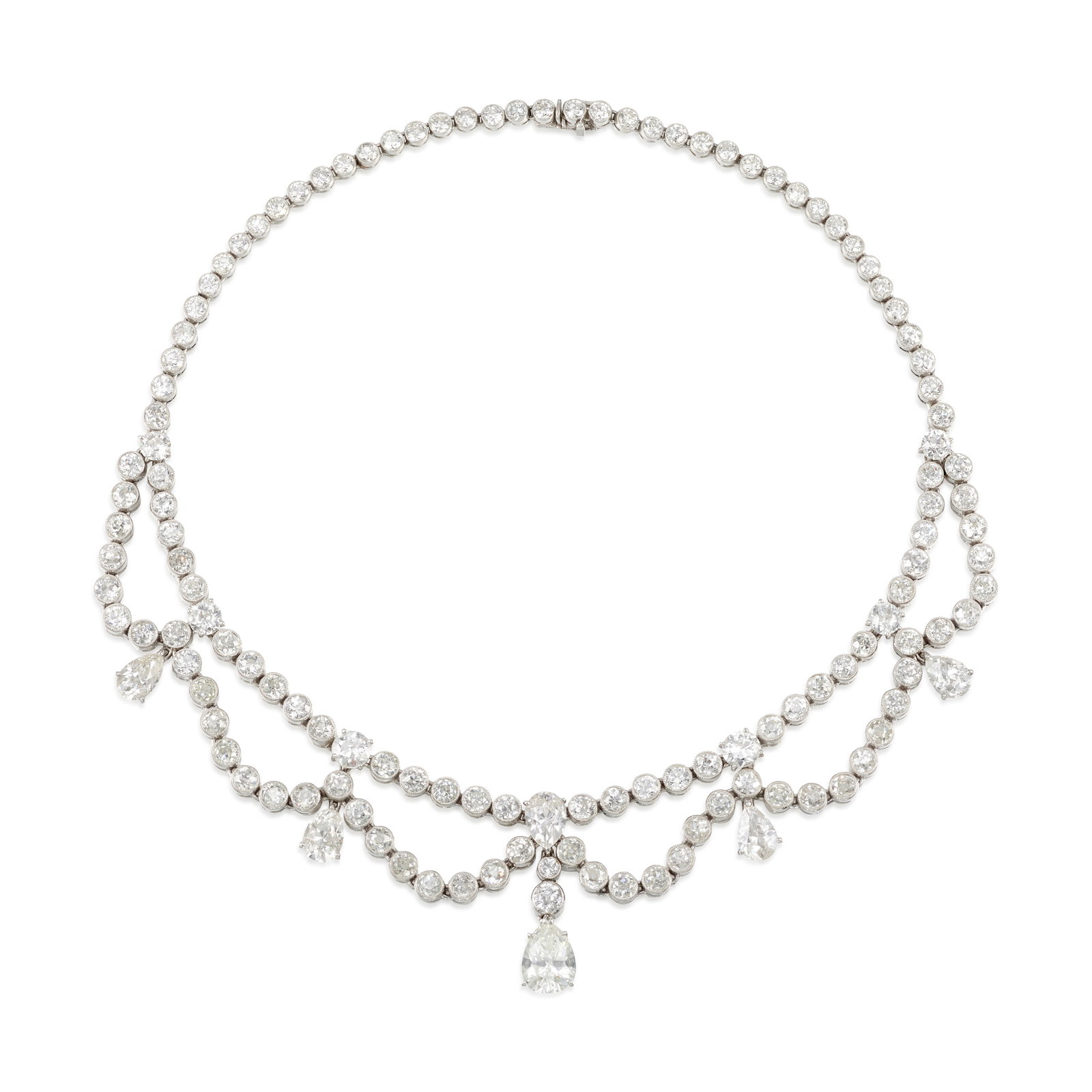 A DIAMOND NECKLACE, CIRCA 1950: A DIAMOND NECKLACE, CIRCA 1950 A line necklace comprising and suspending additional lines of graduated old European and old mine-cut diamonds, accented with pear-shaped diamond drops; estimated