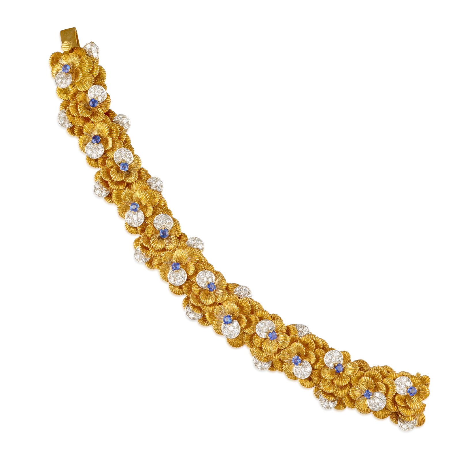 AN 18K GOLD, DIAMOND AND SAPPHIRE BRACELET, CIRCA 1965: AN 18K GOLD, DIAMOND AND SAPPHIRE BRACELET, CIRCA 1965 Composed of dimensional flowers, with textured gold and platinum petals, accented with round brilliant and single-cut diamonds, each flower cente