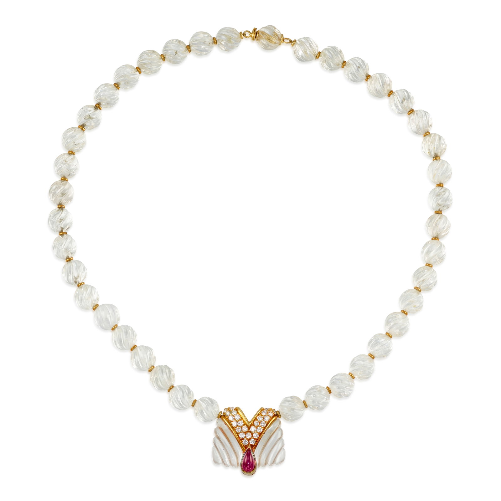 BOUCHERON: AN 18K GOLD, ROCK CRYSTAL, DIAMOND AND RUBY NECKLACE, CIRCA 1970: BOUCHERON: AN 18K GOLD, ROCK CRYSTAL, DIAMOND AND RUBY NECKLACE, CIRCA 1970 Centering a carved rock crystal pendant, accented by a pear-shaped cabochon ruby and round brilliant-cut diamonds, completed