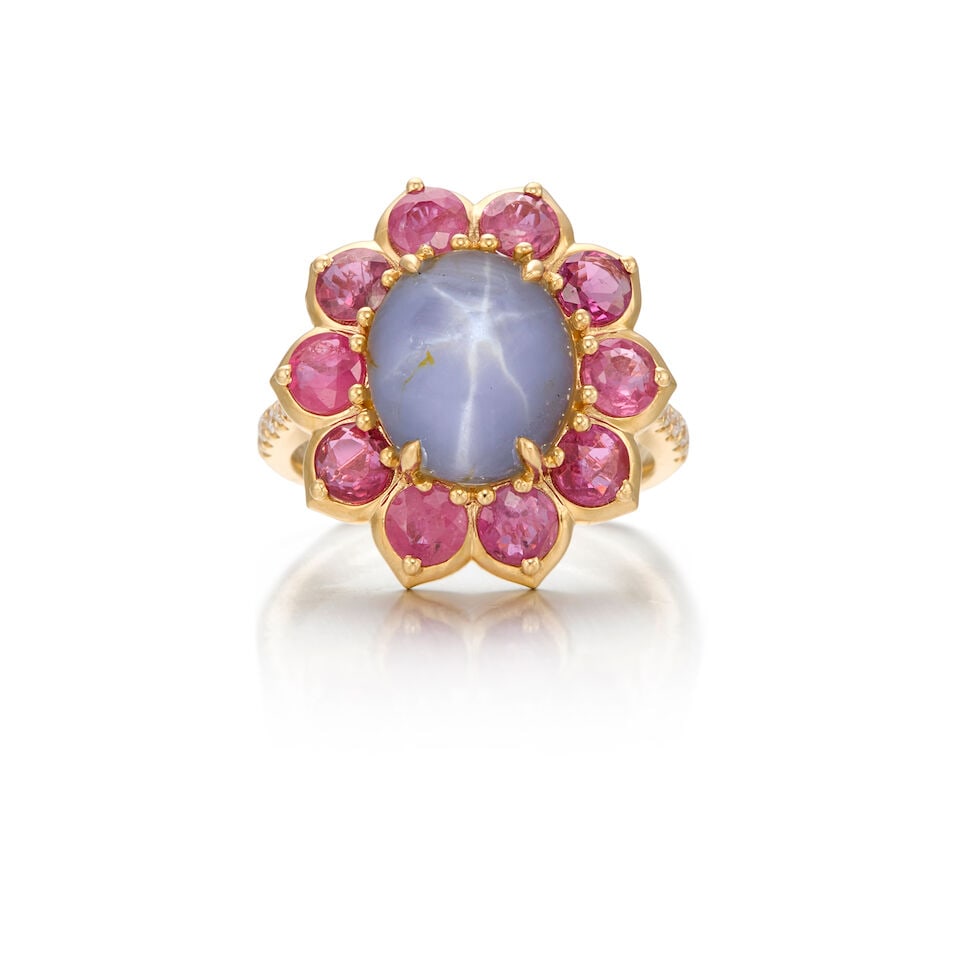 14K YELLOW GOLD, STAR SAPPHIRE, RUBY AND DIAMOND RING: 14K YELLOW GOLD, STAR SAPPHIRE, RUBY AND DIAMOND RING • One oval cabochon shaped star sapphire weighing approximately 7.20 carats total • Ten round shaped rubies weighing approximately