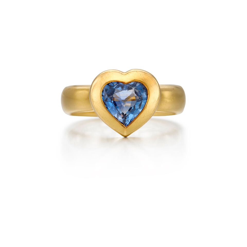 TIFFANY AND CO.: 18K YELLOW GOLD AND SAPPHIRE RING: TIFFANY AND CO.: 18K YELLOW GOLD AND SAPPHIRE RING • One heart shaped sapphire weighing approximately 0.80 carats total • Stamped TIFFANY AND CO. • Size 5 1/4 • Estimated