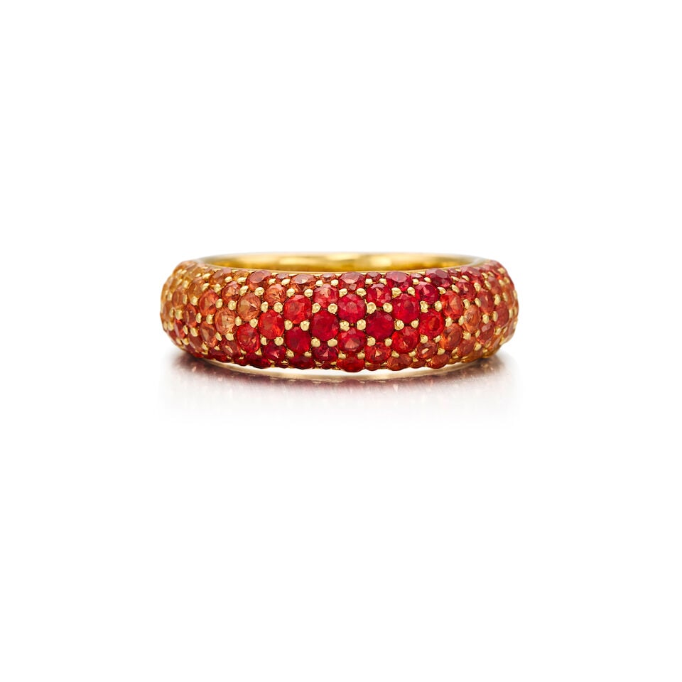 18K YELLOW GOLD AND SAPPHIRE RING: 18K YELLOW GOLD AND SAPPHIRE RING • Numerous round shaped sapphires weighing approximately 1.80 carats total • Size 5 1/2 • Estimated gross weight: 5.9 grams Footnotes: OVERALL
