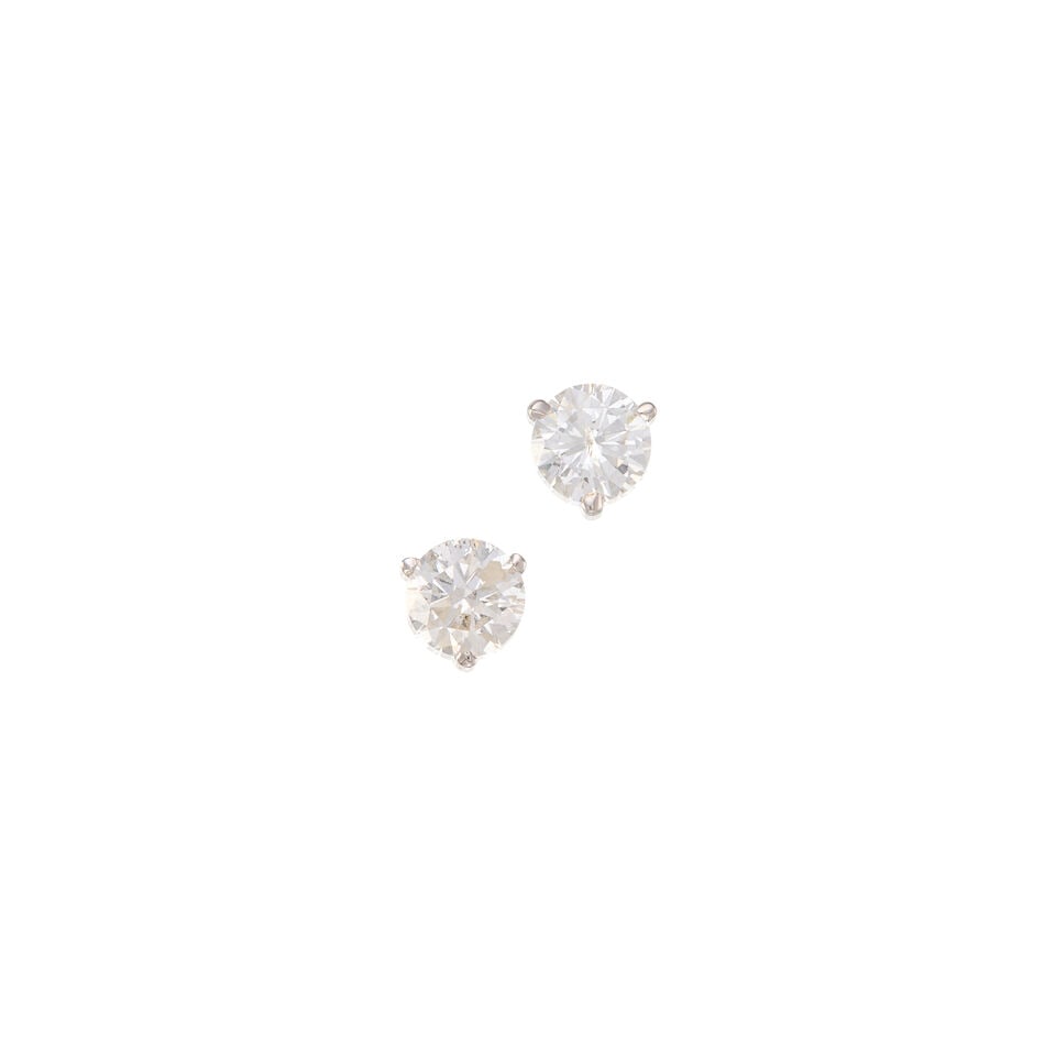 18K WHITE GOLD AND DIAMOND EARRINGS: 18K WHITE GOLD AND DIAMOND EARRINGS • Two round brilliant cut diamonds weighing approximately 1.40 carats total • Measures 5/8 in. x 5/16 in. • Estimated gross weight: 1.1