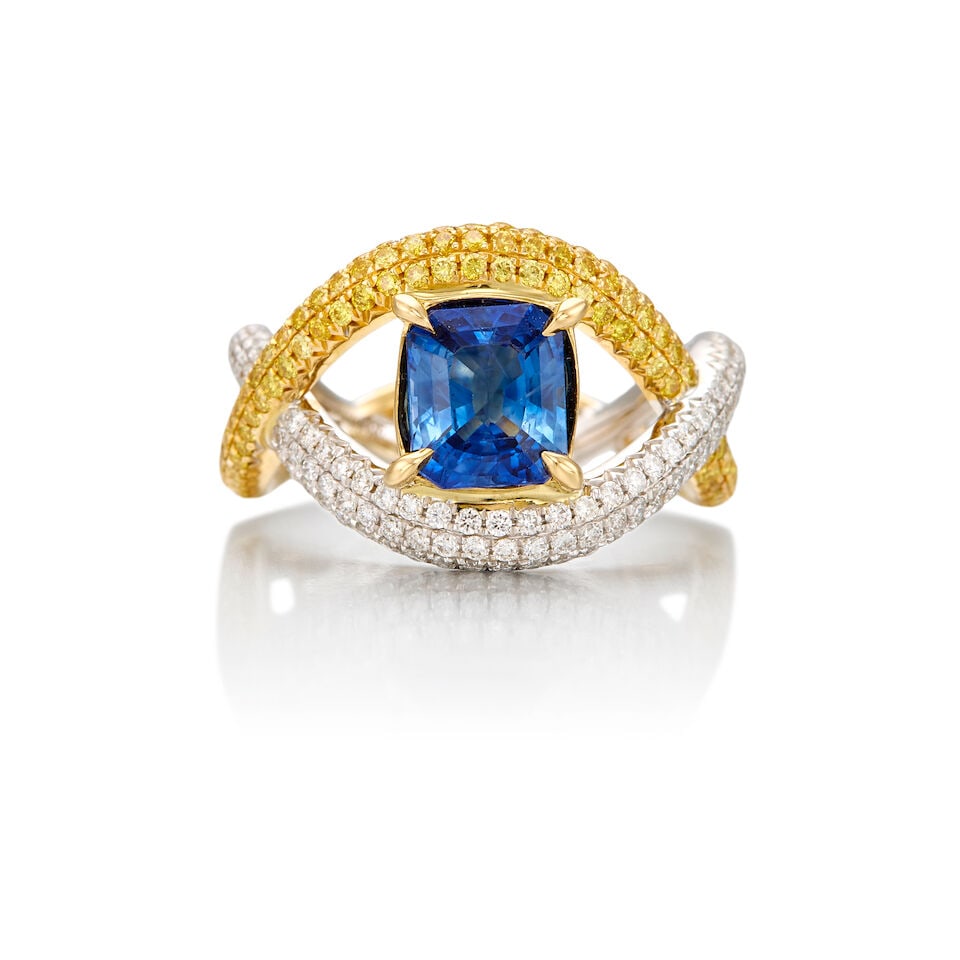 18K BICOLOR GOLD, SAPPHIRE AND DIAMOND RING: 18K BICOLOR GOLD, SAPPHIRE AND DIAMOND RING • 18K yellow and white gold • One square shaped sapphire weighing approximately 1.47 carats total • Numerous round brilliant cut diamonds 