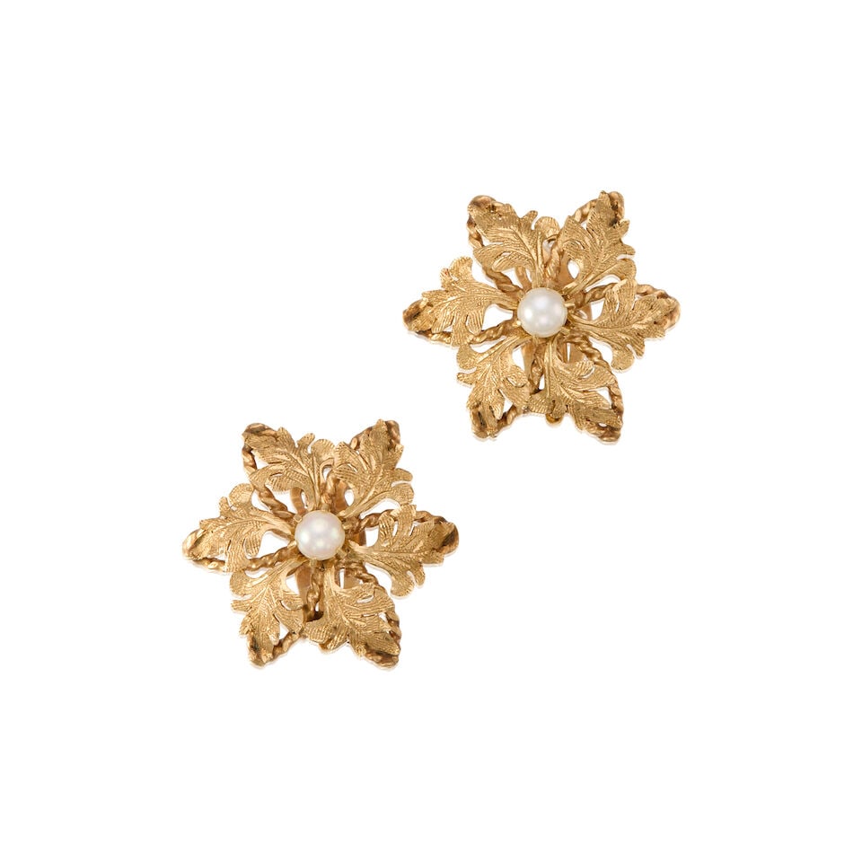 13K YELLOW GOLD AND CULTURED PEARL FLORAL CLIP-ON EARRINGS: 13K YELLOW GOLD AND CULTURED PEARL FLORAL CLIP-ON EARRINGS • Two round cultured pearl measuring approximately 4.23mm in diameter • Measures 1 in. x 1 in. • Estimated gross weight: