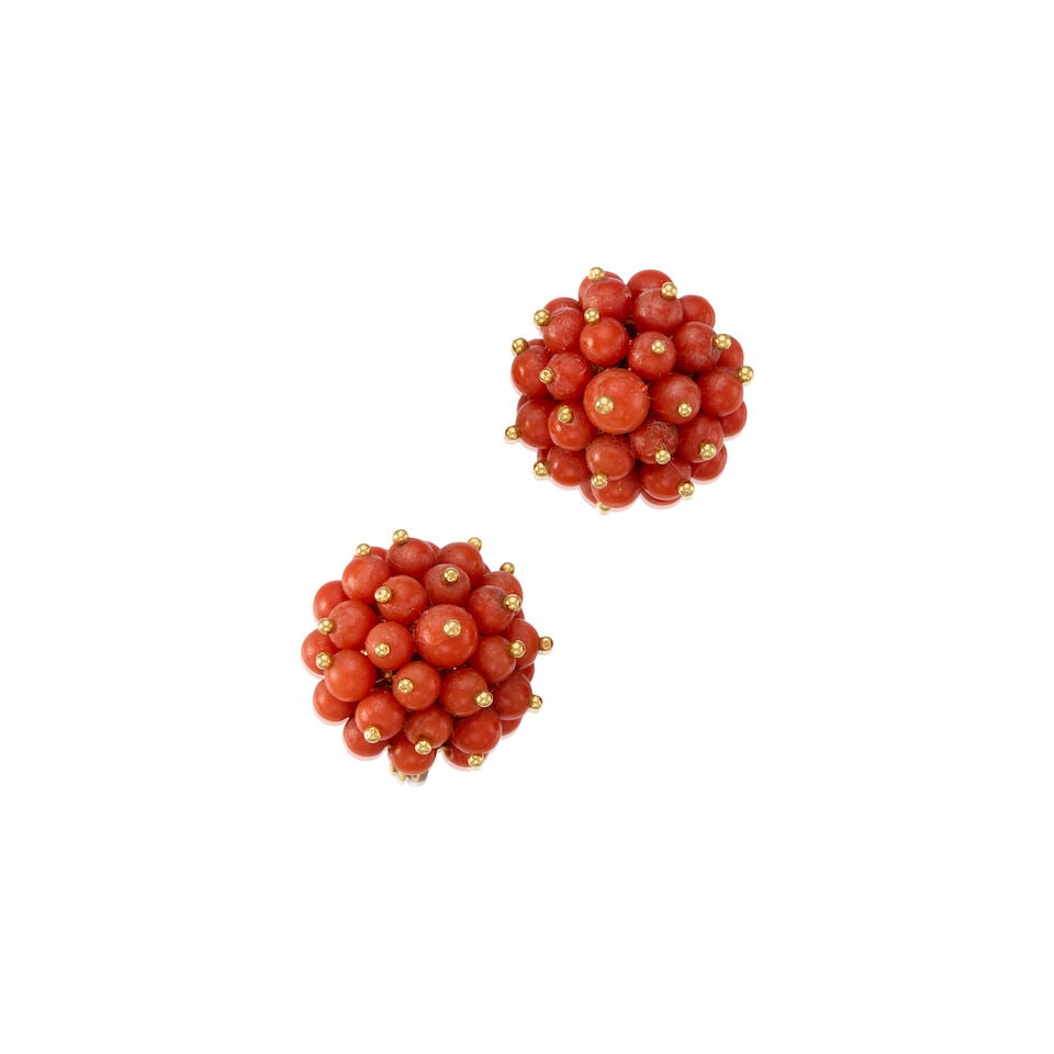18K YELLOW GOLD AND CORAL EARRINGS: 18K YELLOW GOLD AND CORAL EARRINGS • Numerous drilled coral beads measuring approximately 4.07mm to 5.13mm in diameter • Measures 1/2 in. x 3/4 in. • Estimated gross weight: 7.2