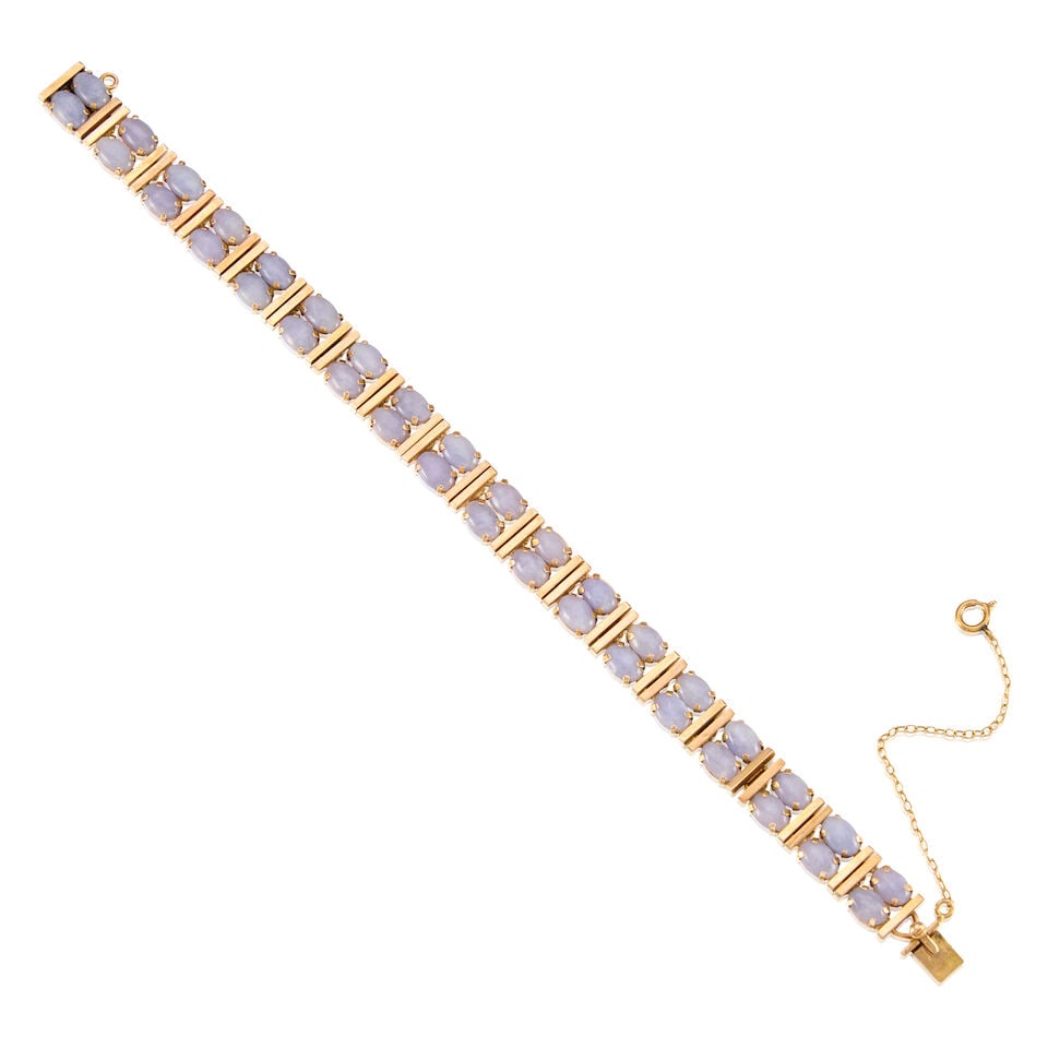 14K YELLOW GOLD AND JADE BRACELET: 14K YELLOW GOLD AND JADE BRACELET • Thirty-six jades measuring approximately 5.86mm x 3.87mm • Length 9 in. • Estimated gross weight: 1.43 grams Footnotes: This jade lot is not accom