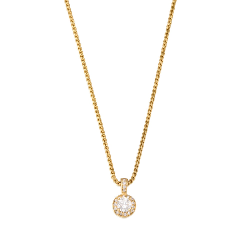 14K YELLOW GOLD AND DIAMOND PENDANT NECKLACE: 14K YELLOW GOLD AND DIAMOND PENDANT NECKLACE • A round brilliant cut diamond weighing approximately 1 carat • Numerous round shaped diamonds weighing approximately 0.18 carat total