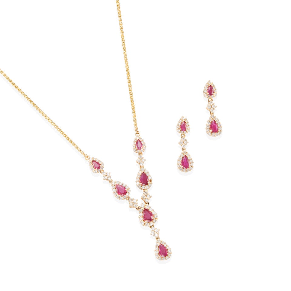 GOLD, RUBY AND DIAMOND SET: GOLD, RUBY AND DIAMOND SET • One 14k yellow gold necklace with 6 pear shaped rubies weighing approximately 2.10 carats total, numerous round shaped diamonds weighing approximately 1.20 carats