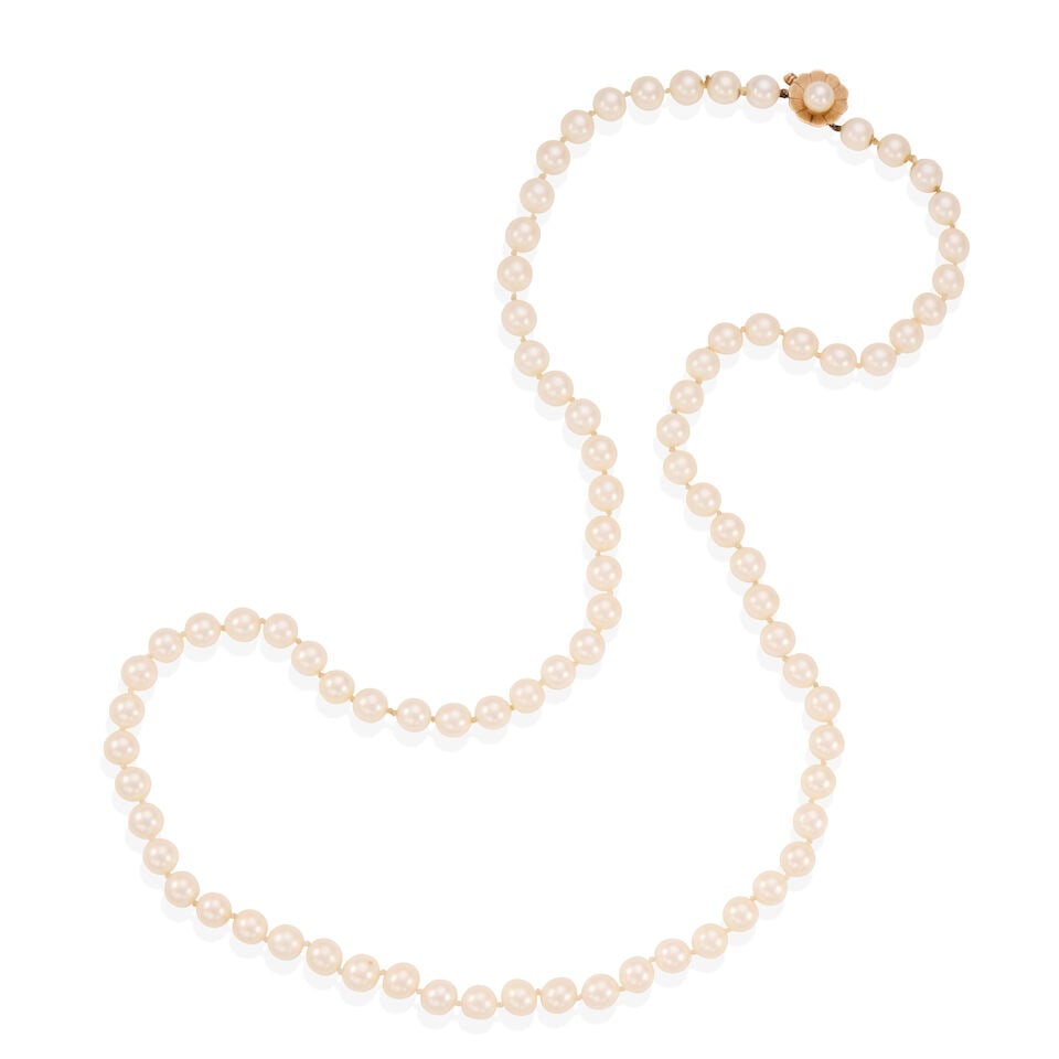 14K YELLOW GOLD AND CULTURED PEARL NECKLACE: 14K YELLOW GOLD AND CULTURED PEARL NECKLACE • Numerous cultured pearls measuring approximately 7.90mm in diameter • Length 29 in. • Estimated gross weight: 57.1 grams Footnotes: OVER