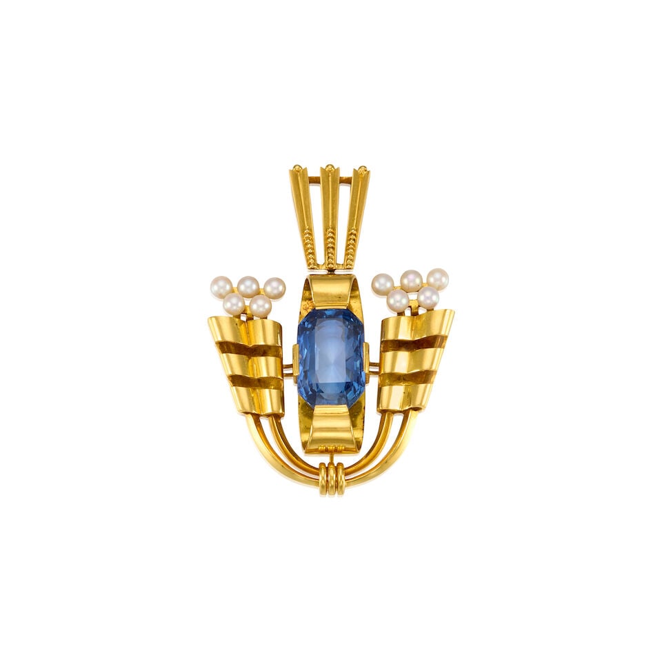 14K YELLOW GOLD, SYNTHETIC SAPPHIRE AND CULTURED PEARL PENDANT: 14K YELLOW GOLD, SYNTHETIC SAPPHIRE AND CULTURED PEARL PENDANT • One rectangular shaped synthetic sapphire weighing approximately 8.30 carats total • Ten round cultured pearls measuring