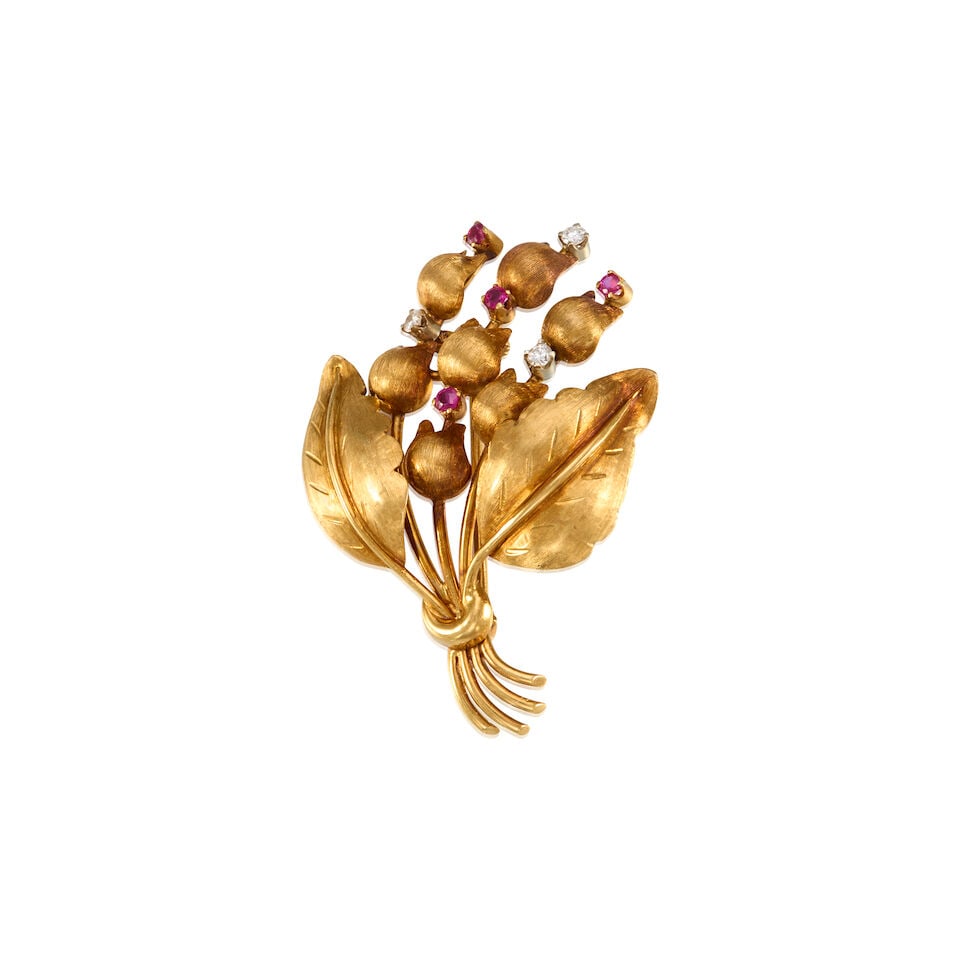 TIFFANY & CO.: 18K YELLOW GOLD, RUBY, AND DIAMOND BROOCH: TIFFANY & CO.: 18K YELLOW GOLD, RUBY, AND DIAMOND BROOCH • Four round shaped rubies weighing approximately 0.08 carat total • Three round shaped diamonds weighing approximately 0.12 carat 