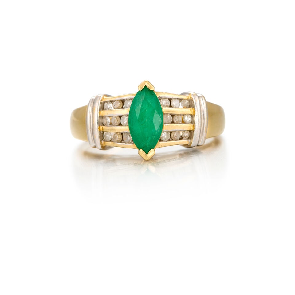 14K BICOLOR GOLD, EMERALD AND DIAMOND RING: 14K BICOLOR GOLD, EMERALD AND DIAMOND RING • 14K yellow and white gold • One marquise shaped emerald weighing approximately 0.70 carat total • Eighteen round single cut diamonds