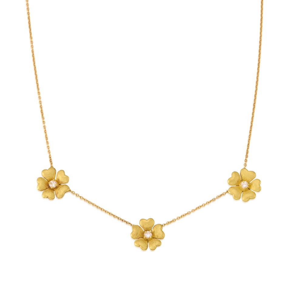 YELLOW GOLD, FLORAL PETAL AND DIAMOND NECKLACE: YELLOW GOLD, FLORAL PETAL AND DIAMOND NECKLACE • Three round brilliant cut diamonds weighing approximately 0.21 carat total • Length 19 in. • Estimated gross weight: 5.8 grams Footno