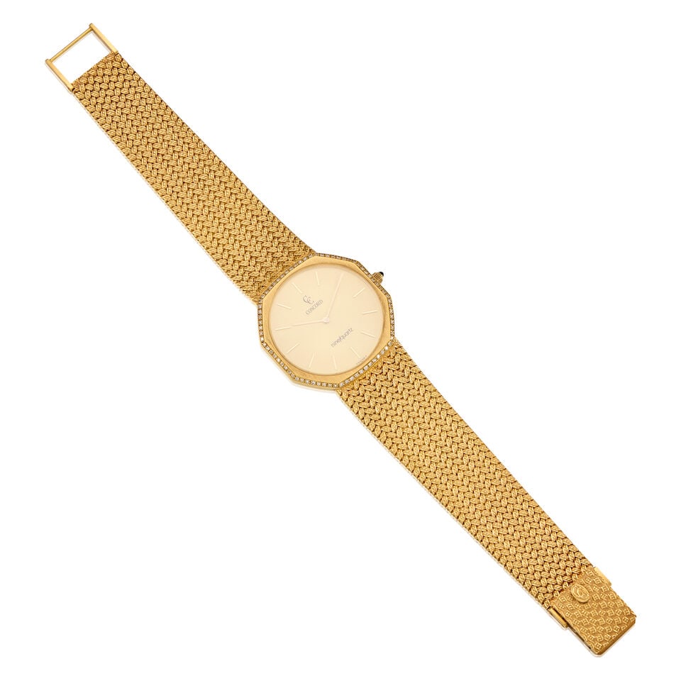 CONCORD: 18K YELLOW GOLD AND DIAMOND WRISTWATCH: CONCORD: 18K YELLOW GOLD AND DIAMOND WRISTWATCH • 18K yellow gold watch case and bracelet • Numerous round shaped diamonds • Signed CONCORD on the dial • With serial
