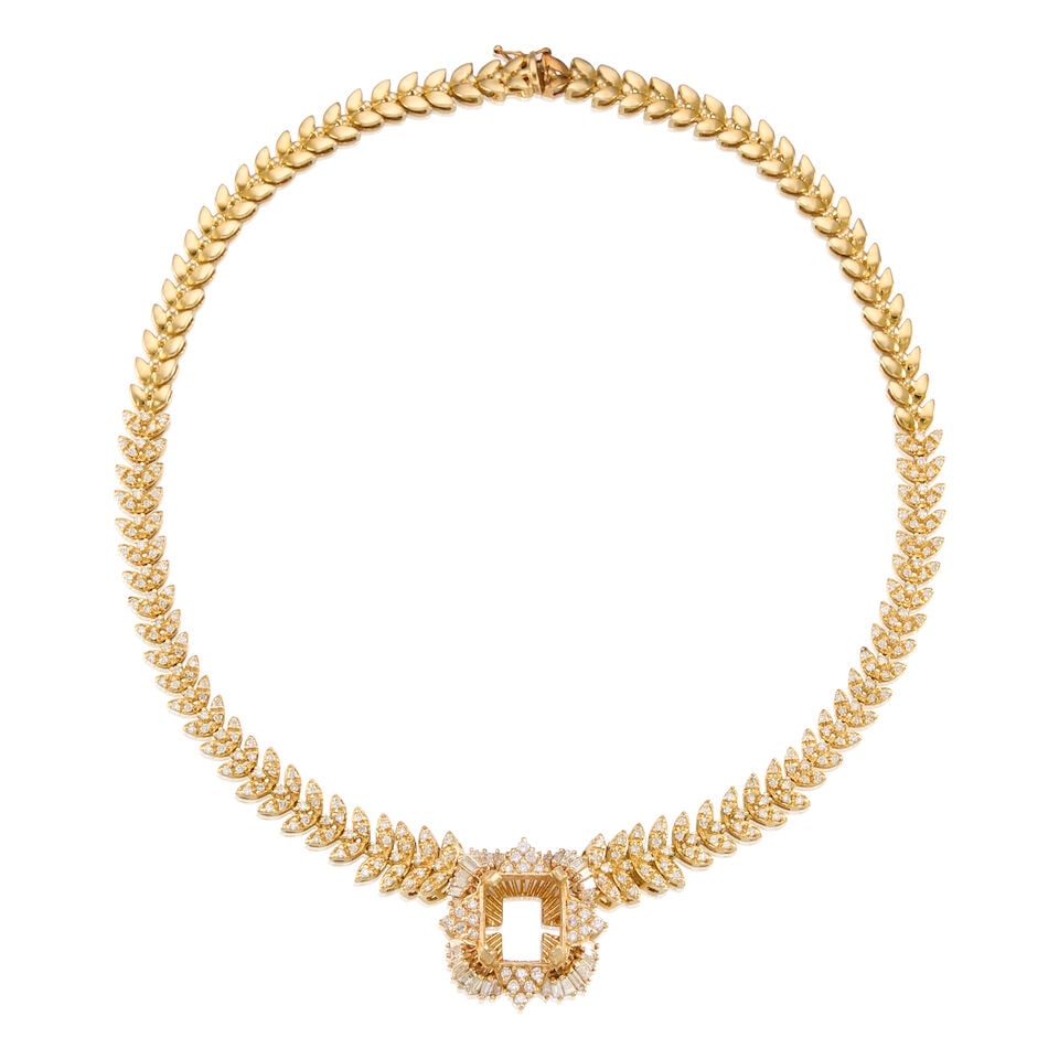 14K YELLOW GOLD AND DIAMOND NECKLACE: 14K YELLOW GOLD AND DIAMOND NECKLACE • Numerous tapered baguette diamonds weighing approximately 0.77 carat total • Numerous round shaped diamonds weighing approximately 2 carats total 