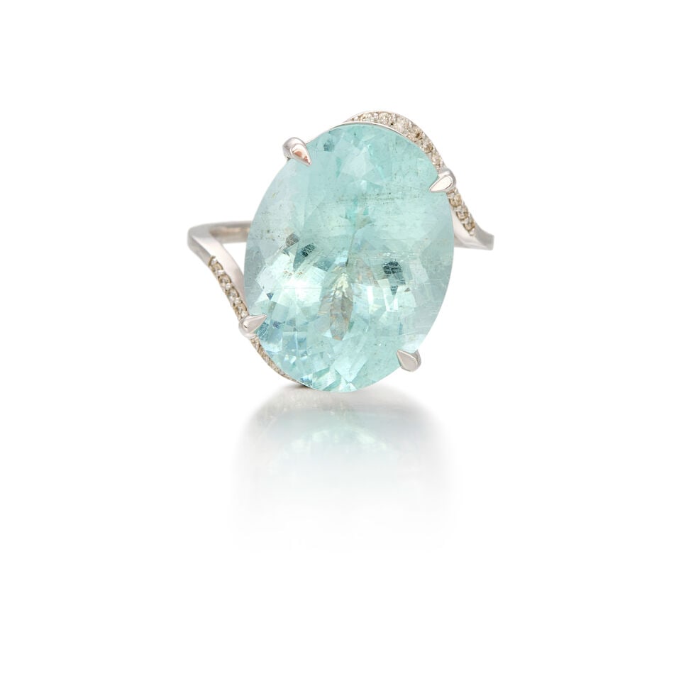 14K WHITE GOLD, AQUAMARINE AND DIAMOND RING: 14K WHITE GOLD, AQUAMARINE AND DIAMOND RING • One oval shaped aquamarine weighing approximately 11.30 carats • Thirty round brilliant cut diamonds weighing approximately 0.15 carat