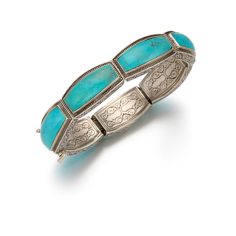 KONSTANTINO: SILVER AND TURQUOISE BRACELET: KONSTANTINO: SILVER AND TURQUOISE BRACELET • Seven rectangular shaped turquoise measuring approximately 24.75mm x 9.16mm • Stamped KOSTANTINO • Inner circumference 7 in. • Esti