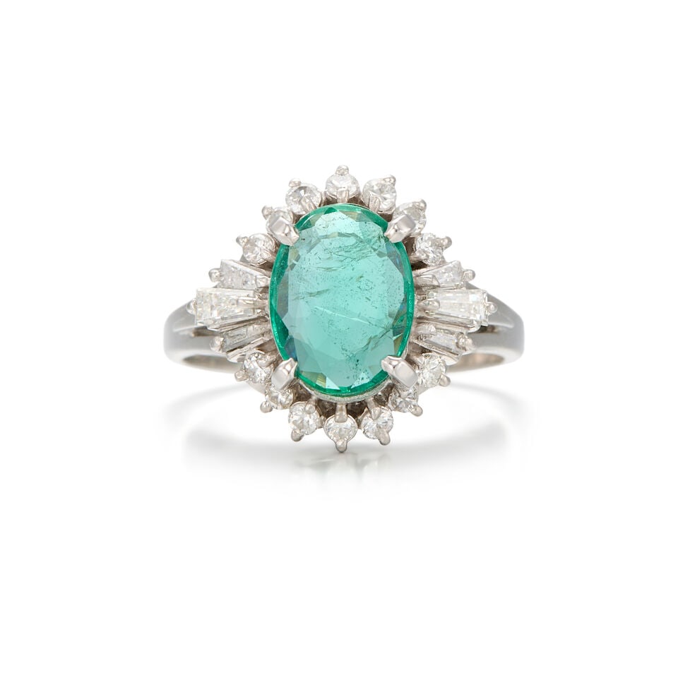 PLATINUM, EMERALD, AND DIAMOND RING: PLATINUM, EMERALD, AND DIAMOND RING • One oval shaped emerald weighing approximately 1.10 carats total • Six tapered baguette diamonds weighing approximately 0.18 carat total •