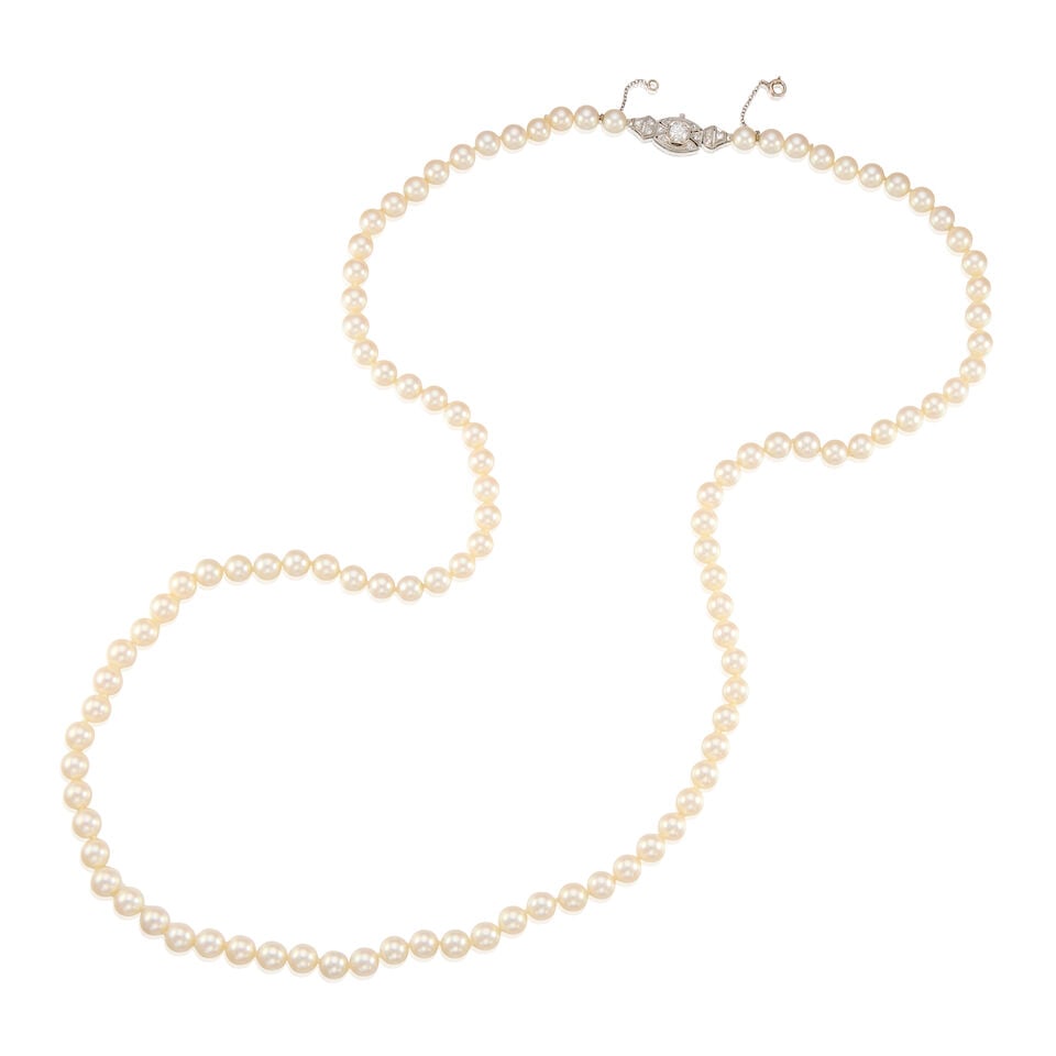 PLATINUM, CULTURED PEARL, AND DIAMOND NECKLACE: PLATINUM, CULTURED PEARL, AND DIAMOND NECKLACE • Numerous cultured pearls measuring approximately 6.30mm in diameter • Thirteen round shaped diamonds weighing approximately 0.55 carat